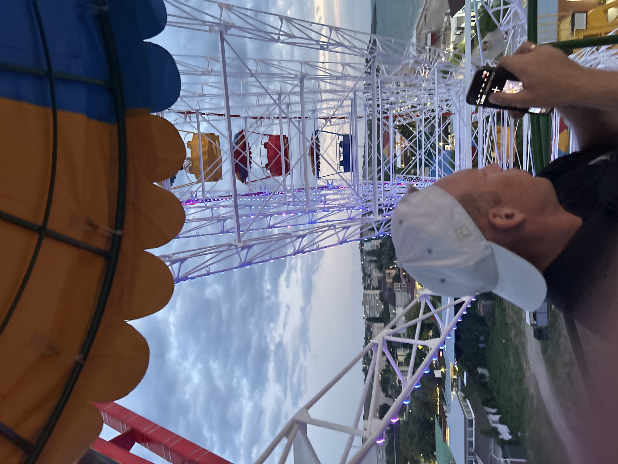 Dusk on the Azov coast: Ferris wheel rides and seafront strolls