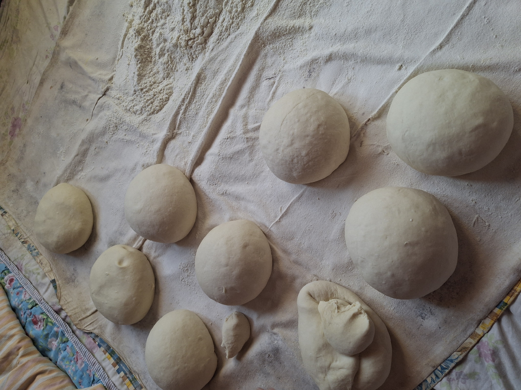 Traditional tandoor bread baking in a Ko`kdala backyard