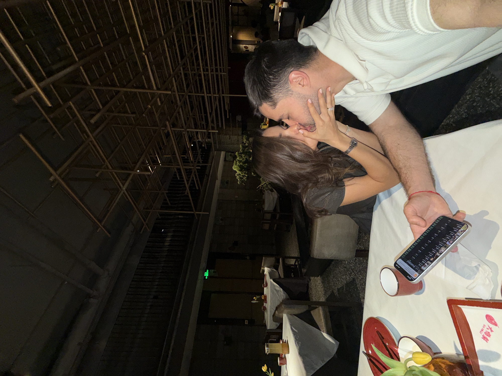 Woman documents restaurant visit with selfies in Beijing's Dongcheng District