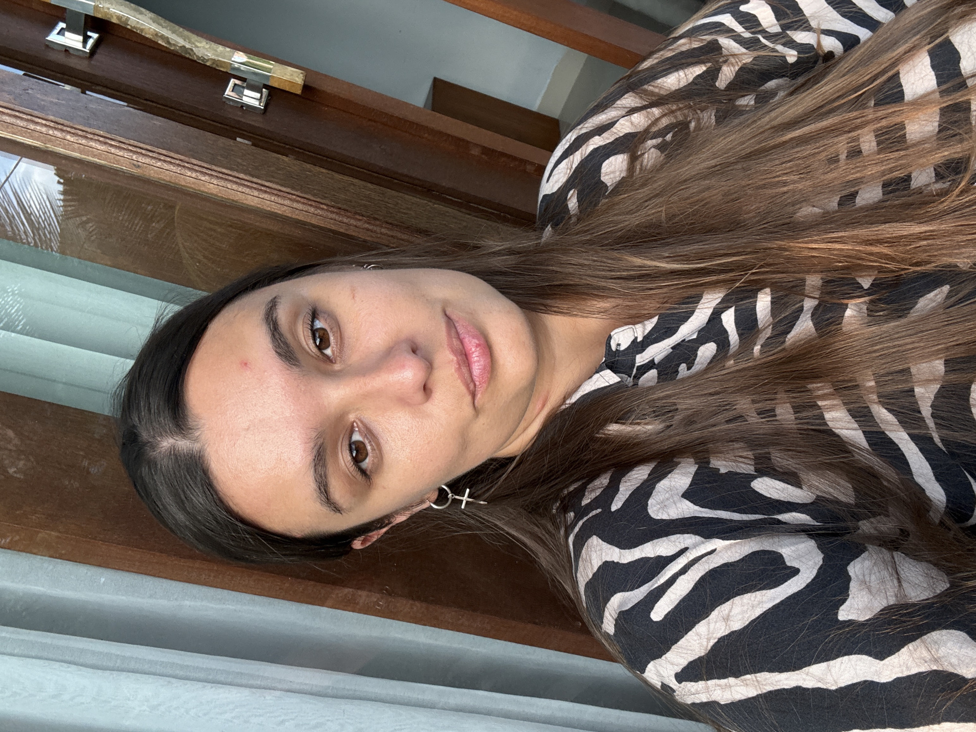 Woman in zebra-print captured in casual moments in Pejeng