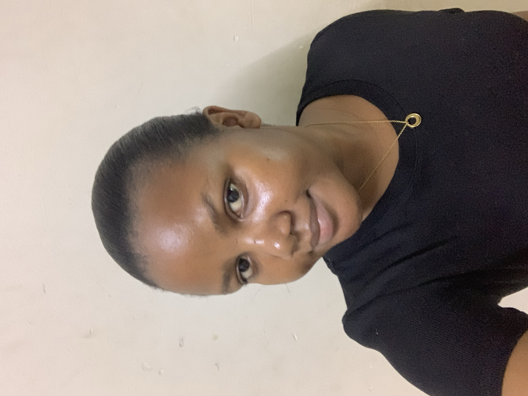 Woman captured in quiet moments at Dar es-Salaam residence