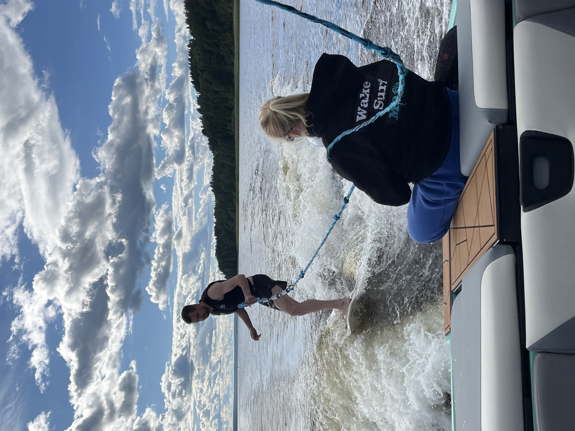 Wake surfing on calm water near Gromovo, Russia