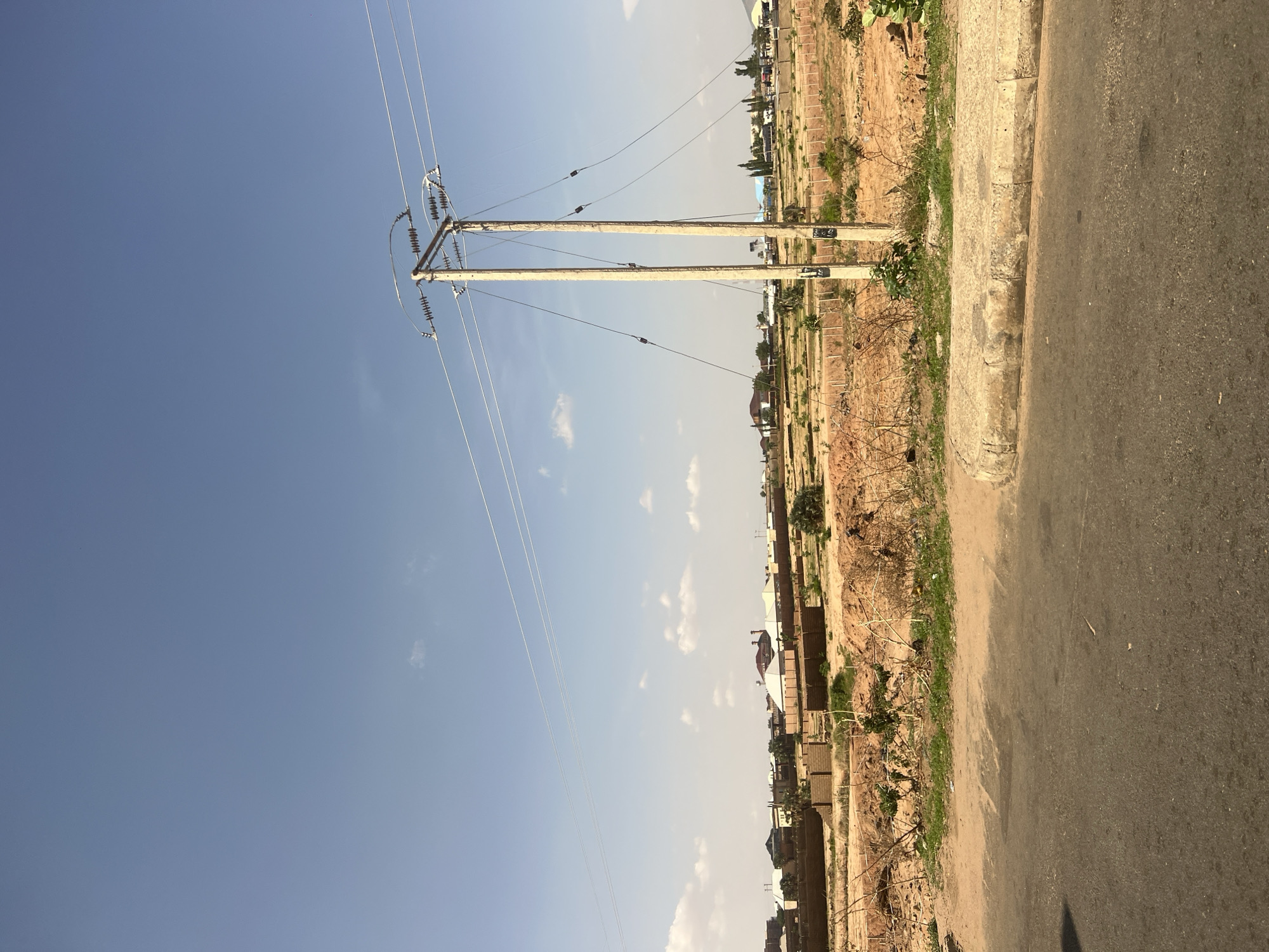 Street scenes captured in Gombe, Nigeria on clear afternoon