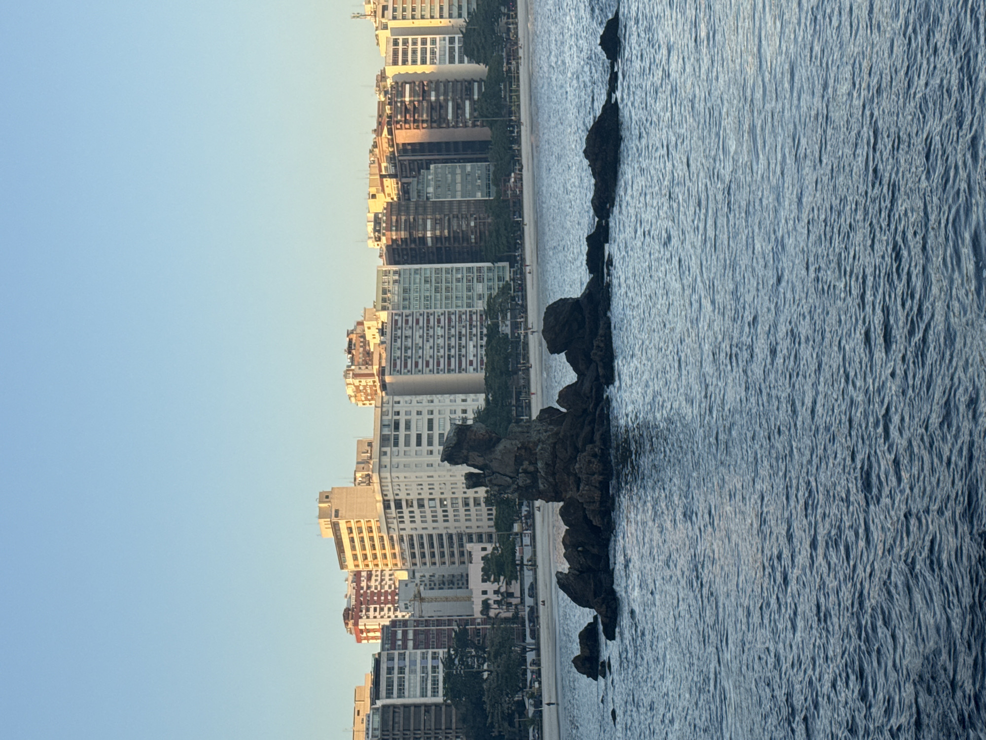 Niterói coastline: rocks, bay views, and fishing at dusk
