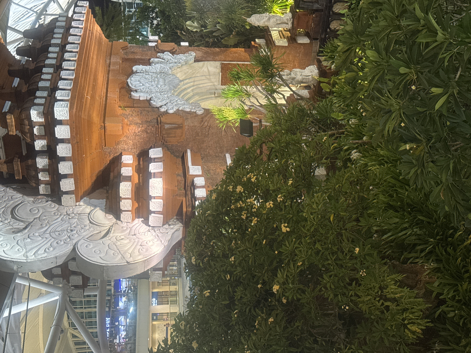 Traditional architecture and airport scenes documented in Kuta, Bali