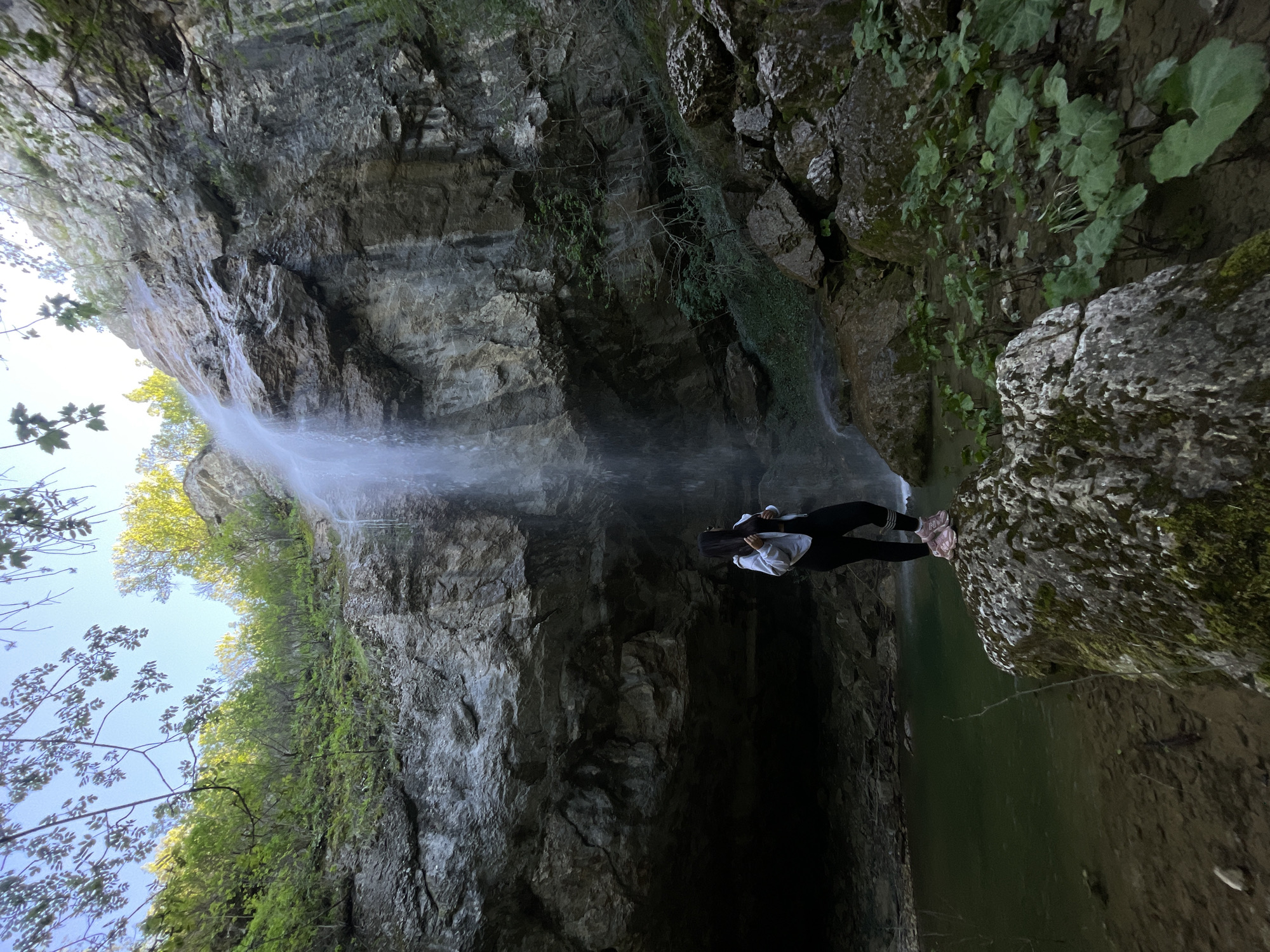 Visitors explore waterfall site in Veselinovo, Bulgaria