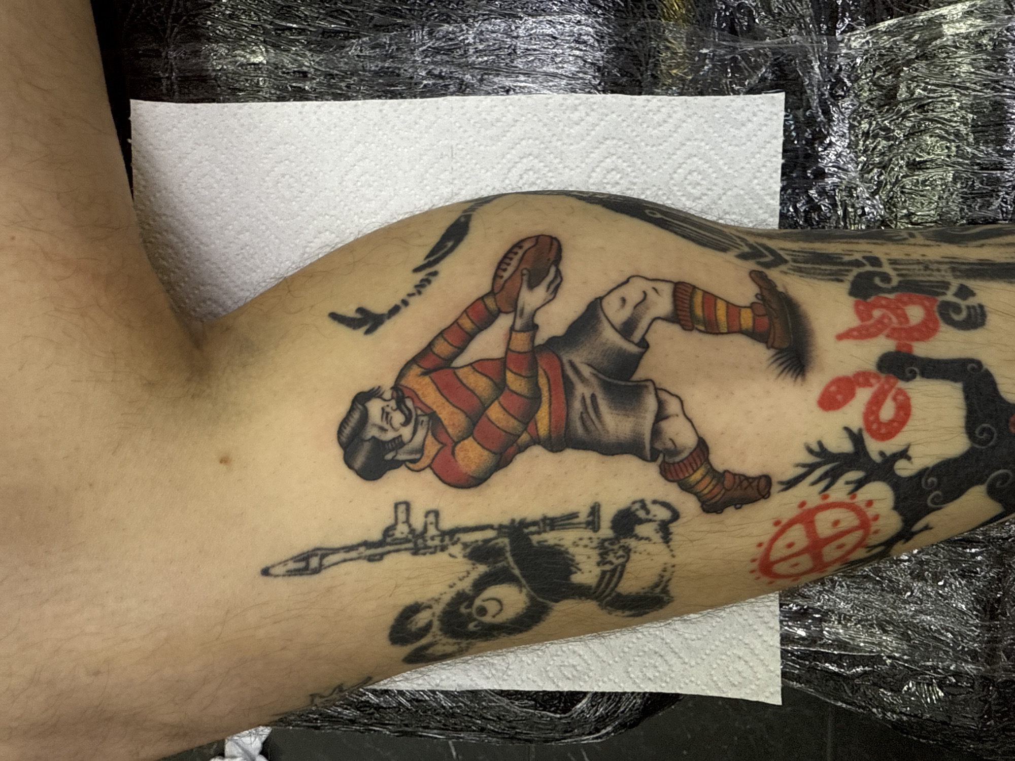 Tattooed person with rugby artwork spotted in Moscow studio