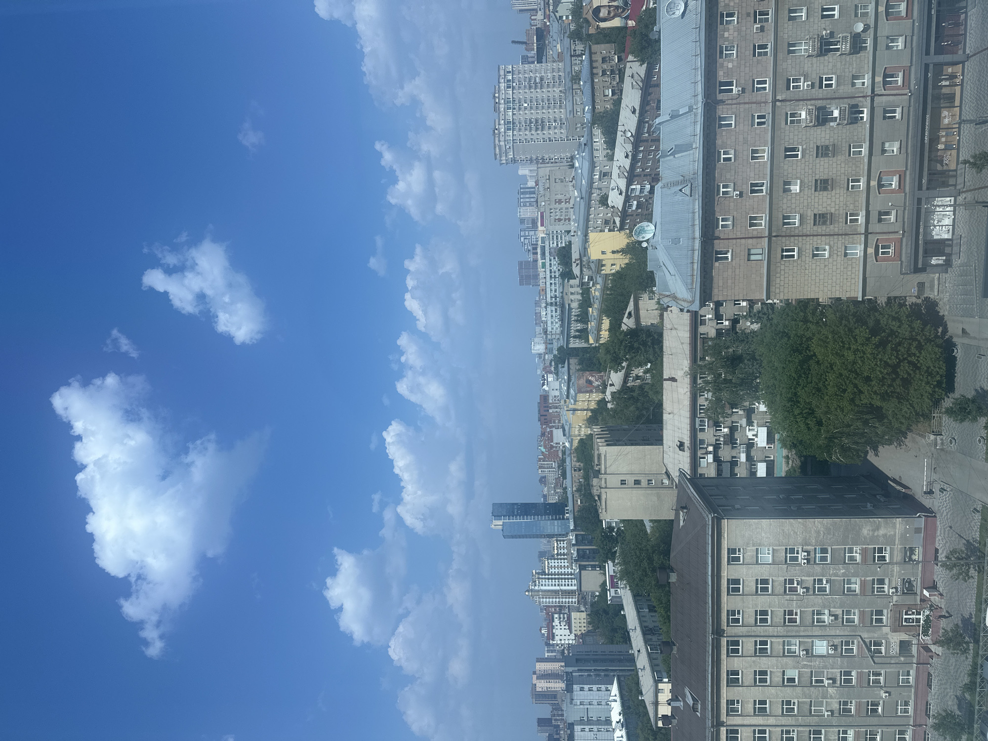Aerial views over Novosibirsk's dense urban core on a clear morning