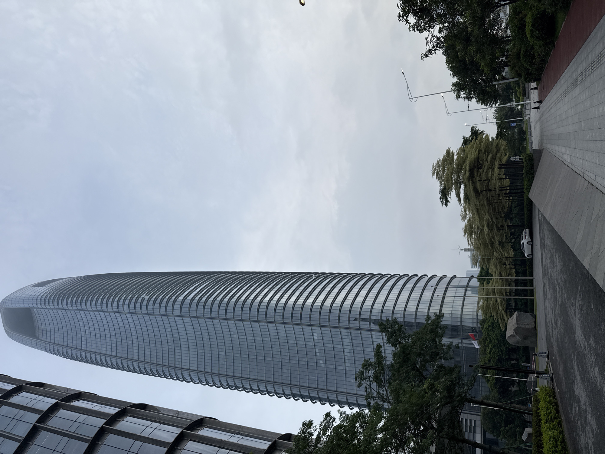 Exploring Haizhu District's modern urban core on a cloudy evening