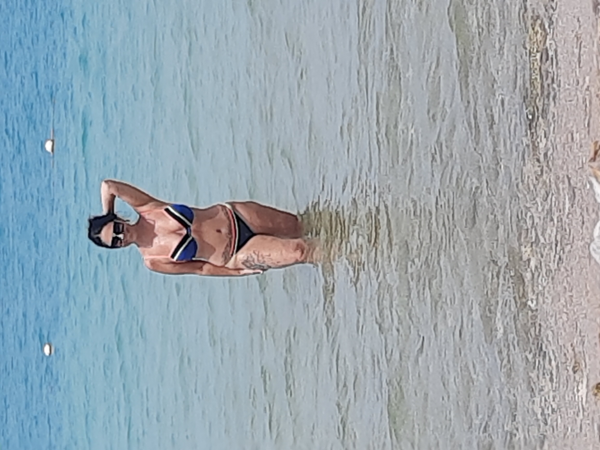 Beachgoers enjoy typical resort activities at Hurghada beach