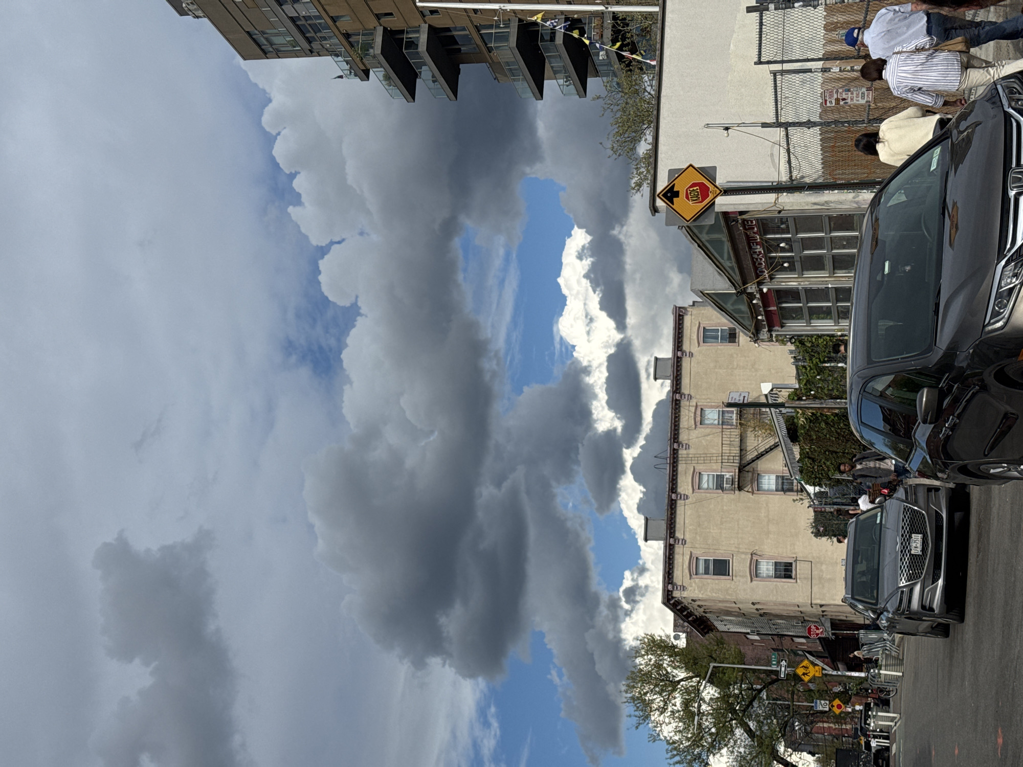 Storm clouds gather over New York City street scene