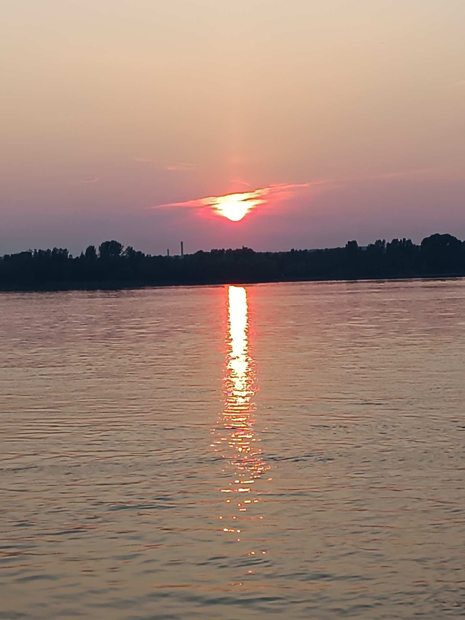 Kama River sunset, Chaikovsky — two angles, one moment