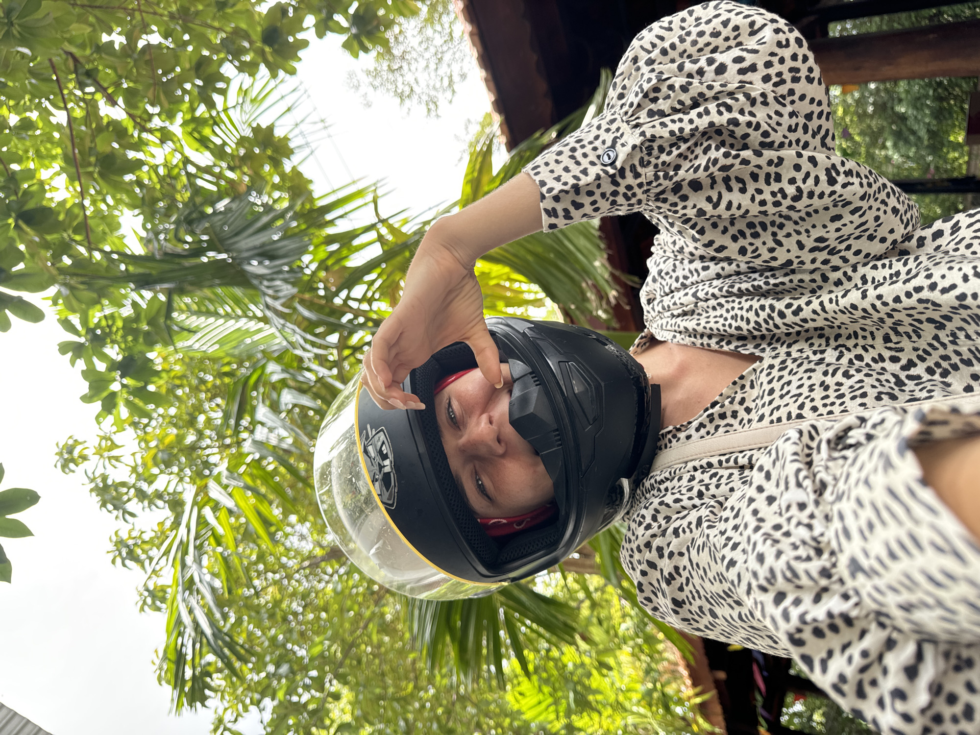 Helmet selfies on a cloudy morning road in Mũi Né