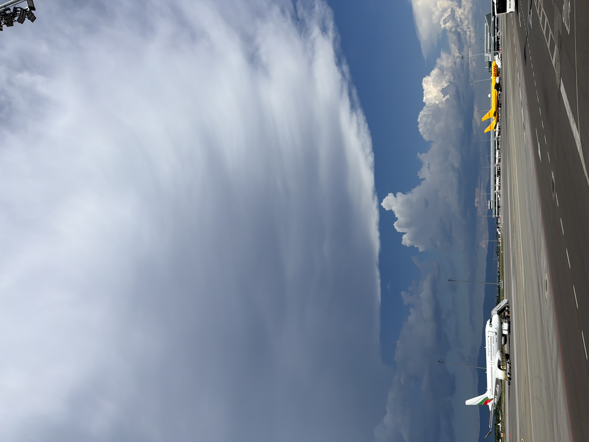 Aircraft parked at Sofia Airport amid stormy conditions