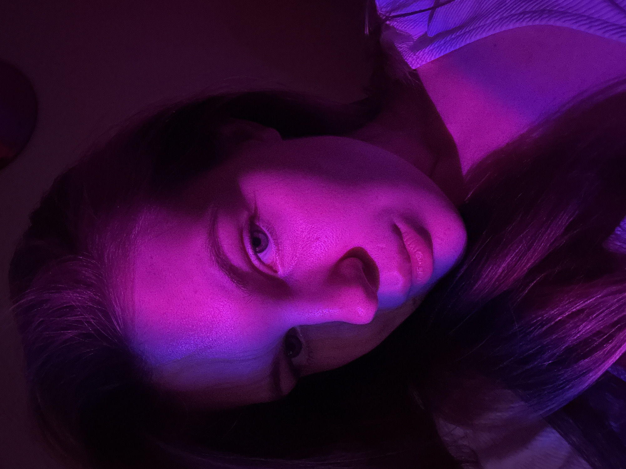 Woman photographed in purple lighting in Belgrade suburb