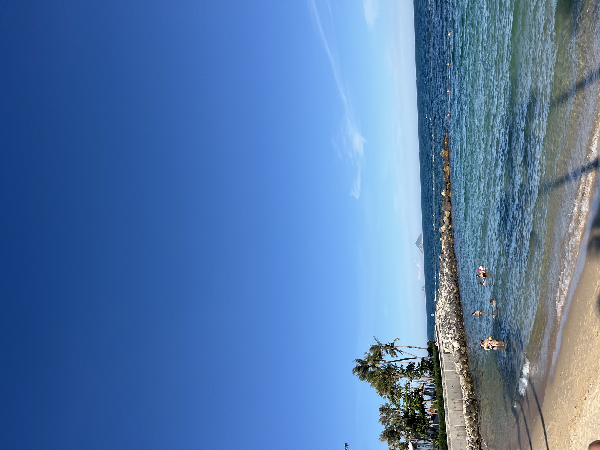 Morning beach day at Nha Trang's shore, swimming and playing