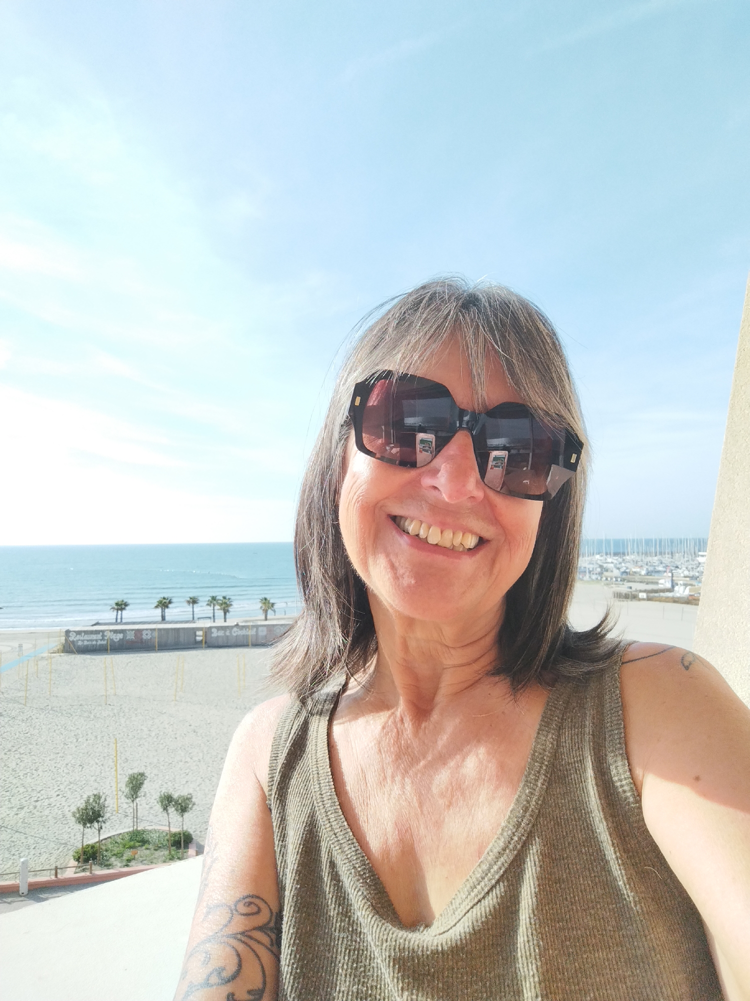 Woman photographed smiling in Palavas-les-Flots, France