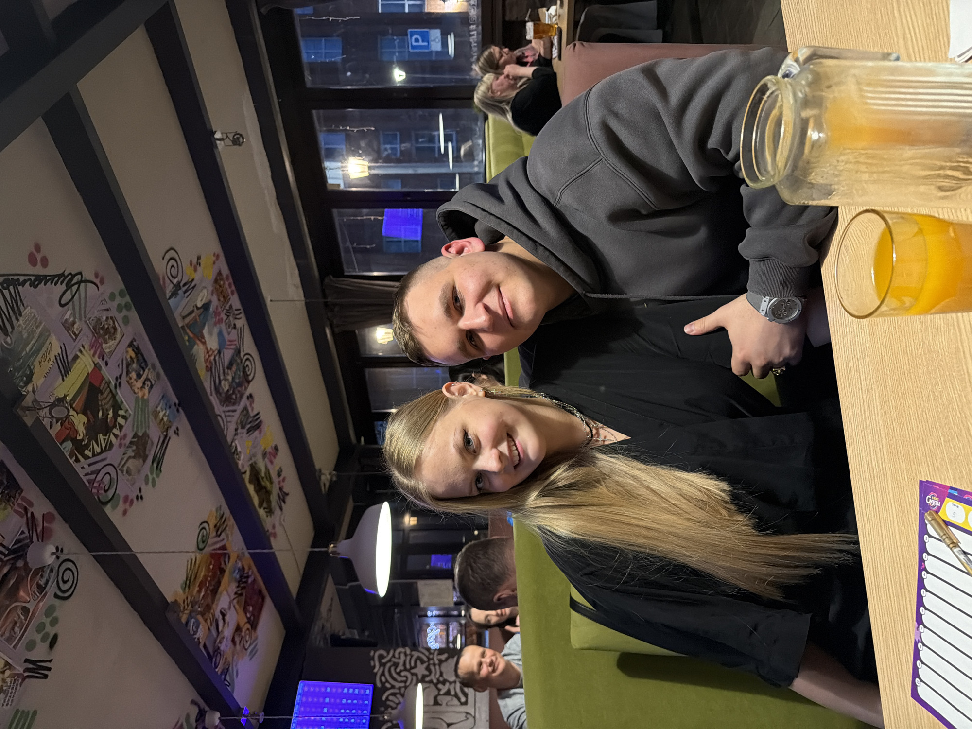 Young couple shares meal at Izhevsk restaurant