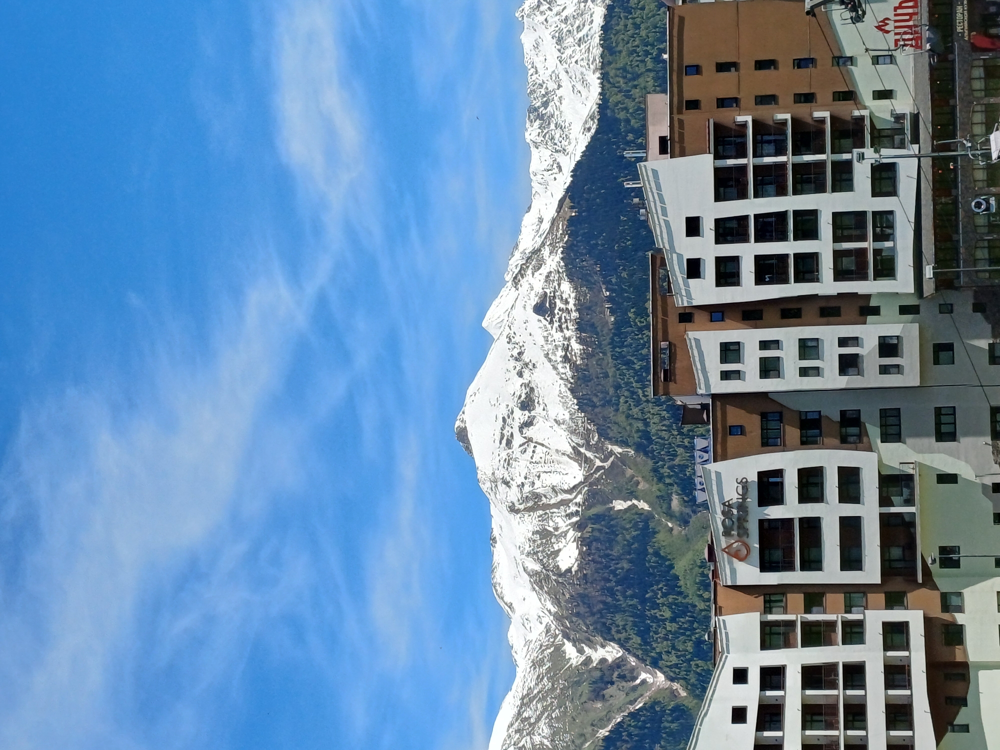 Resort development photographed against snow-capped mountains in Estosadok, Russia