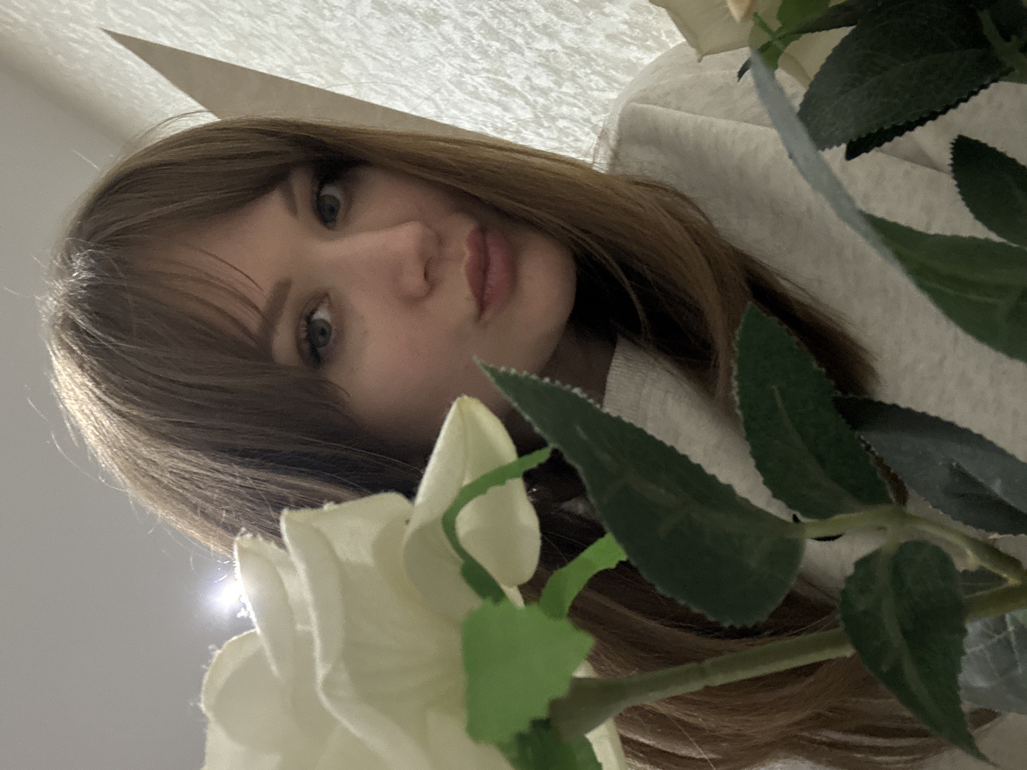 Woman photographed near Saratov high-rises during evening hours