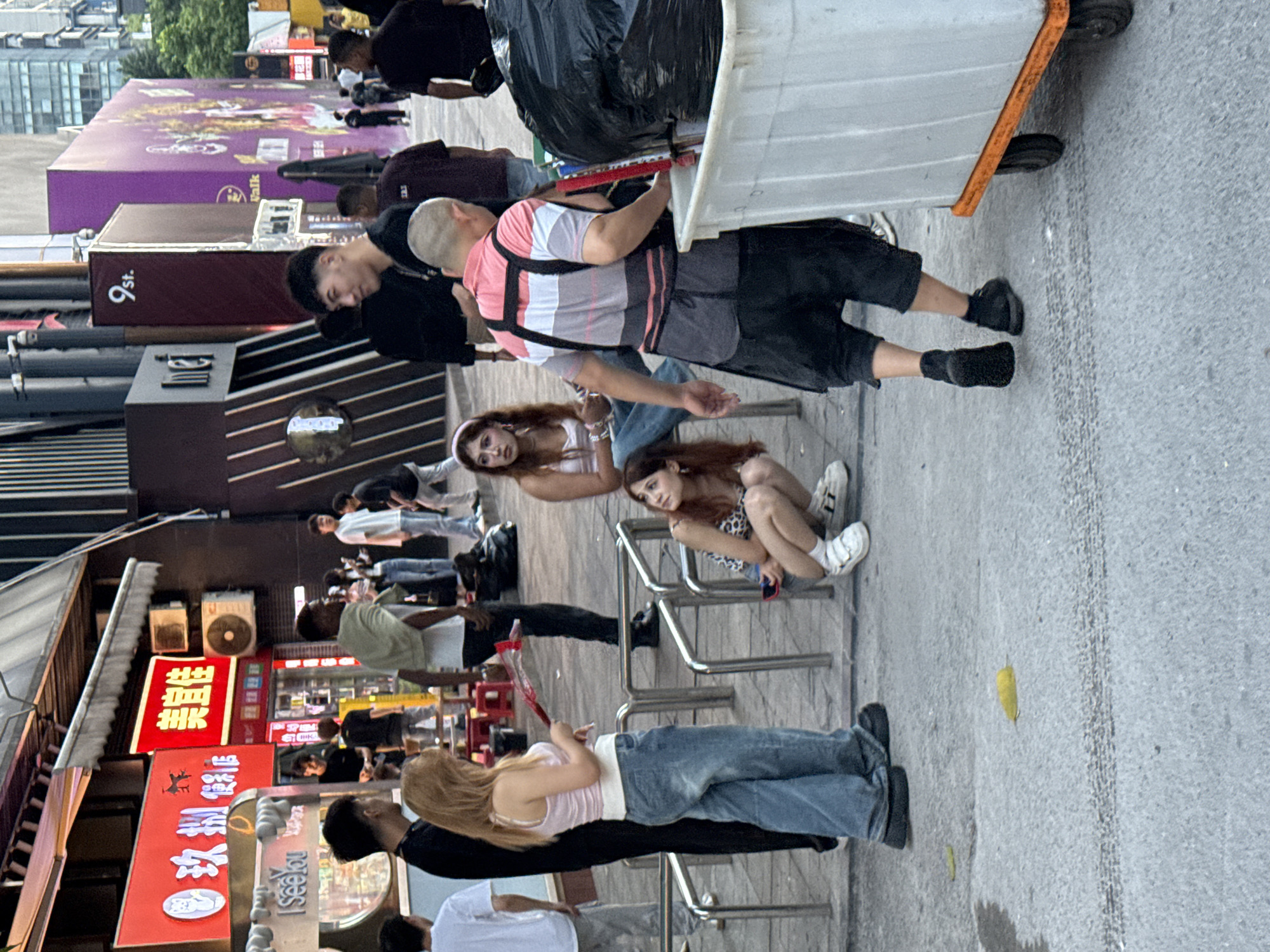 Evening street life documented across two Chinese cities