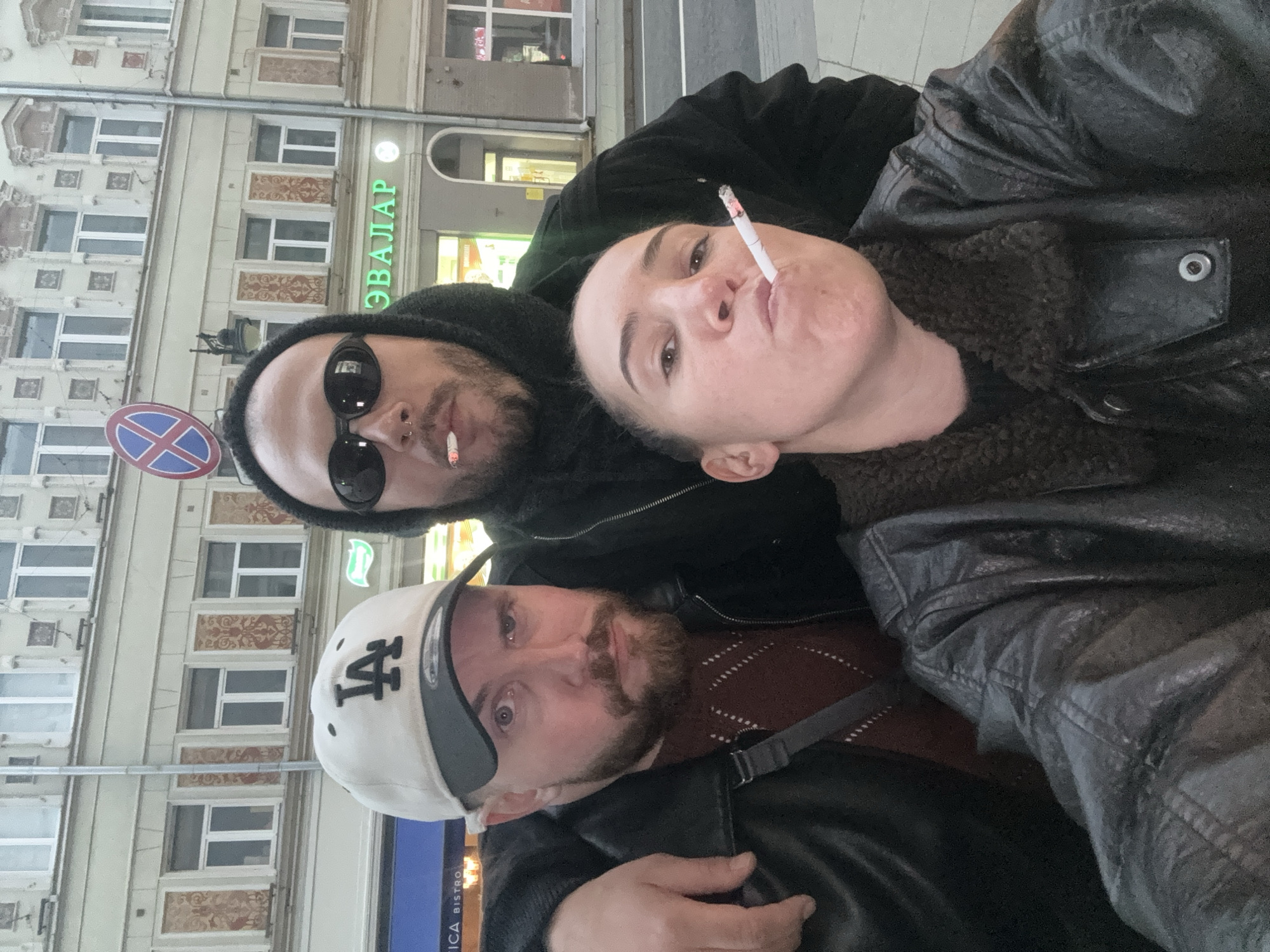 Three people take selfie on Moscow street