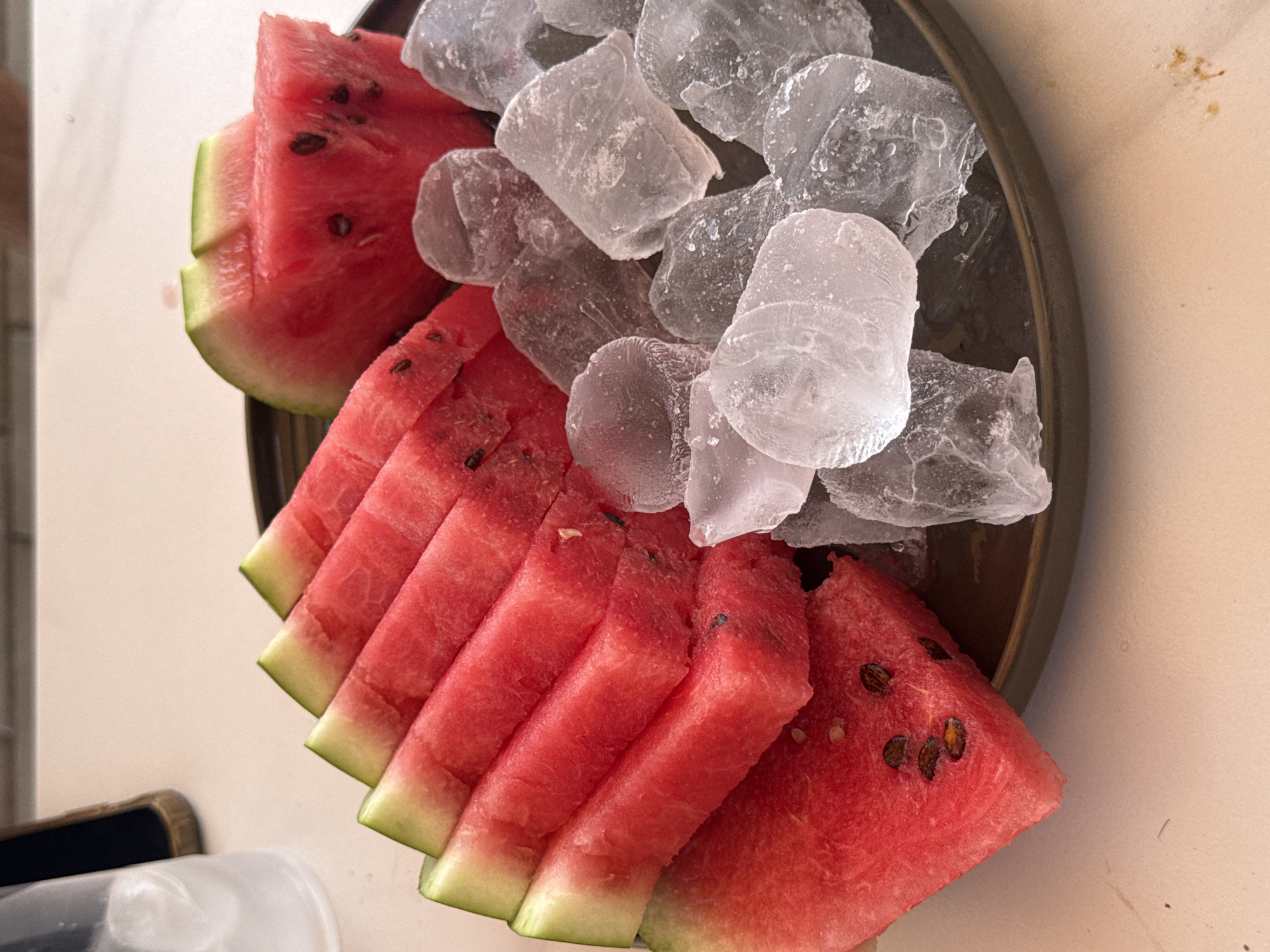 Watermelon and ice cream on a summer afternoon in Ptghni