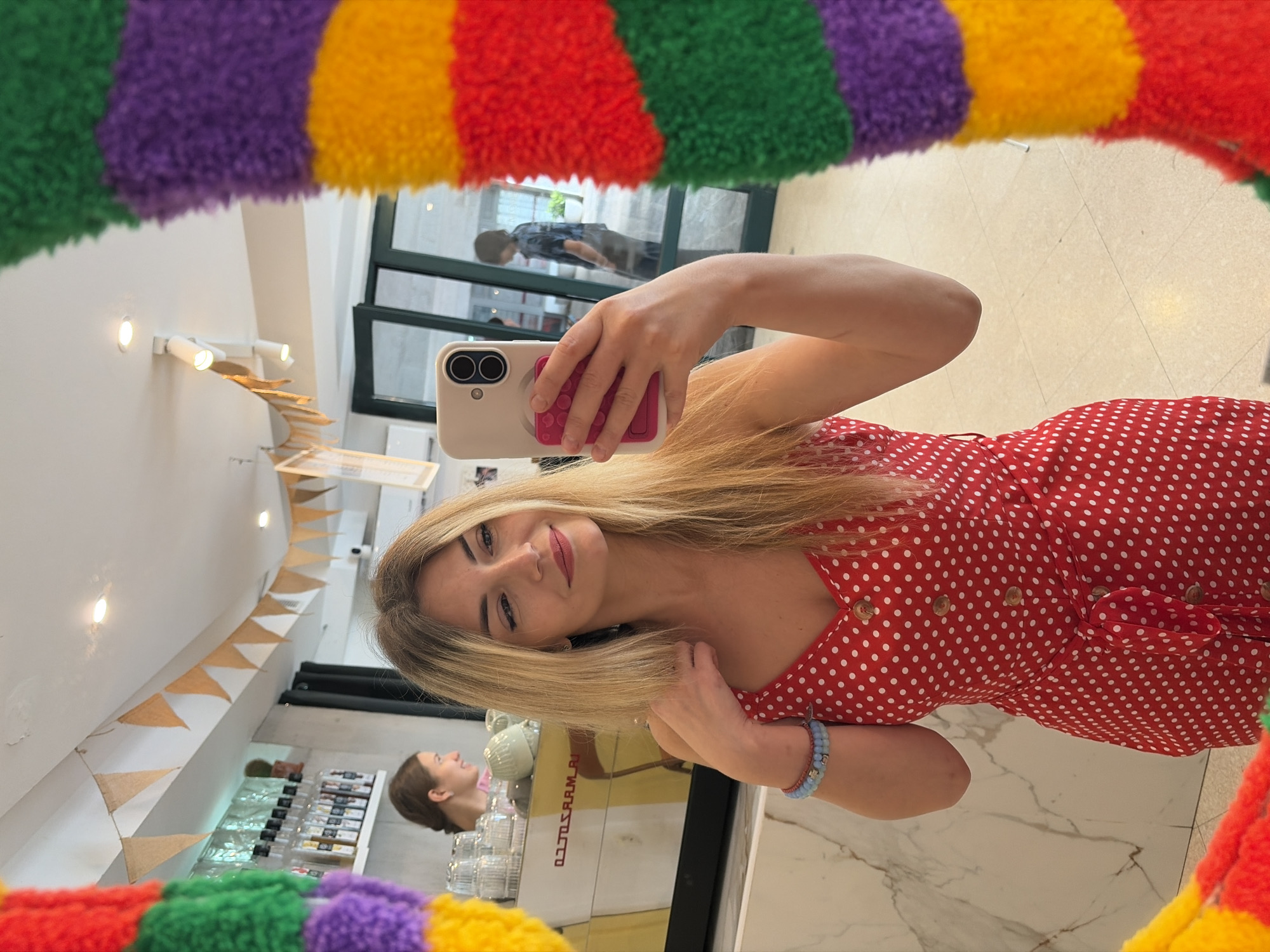 Mirror selfie and a layered iced drink in Budva