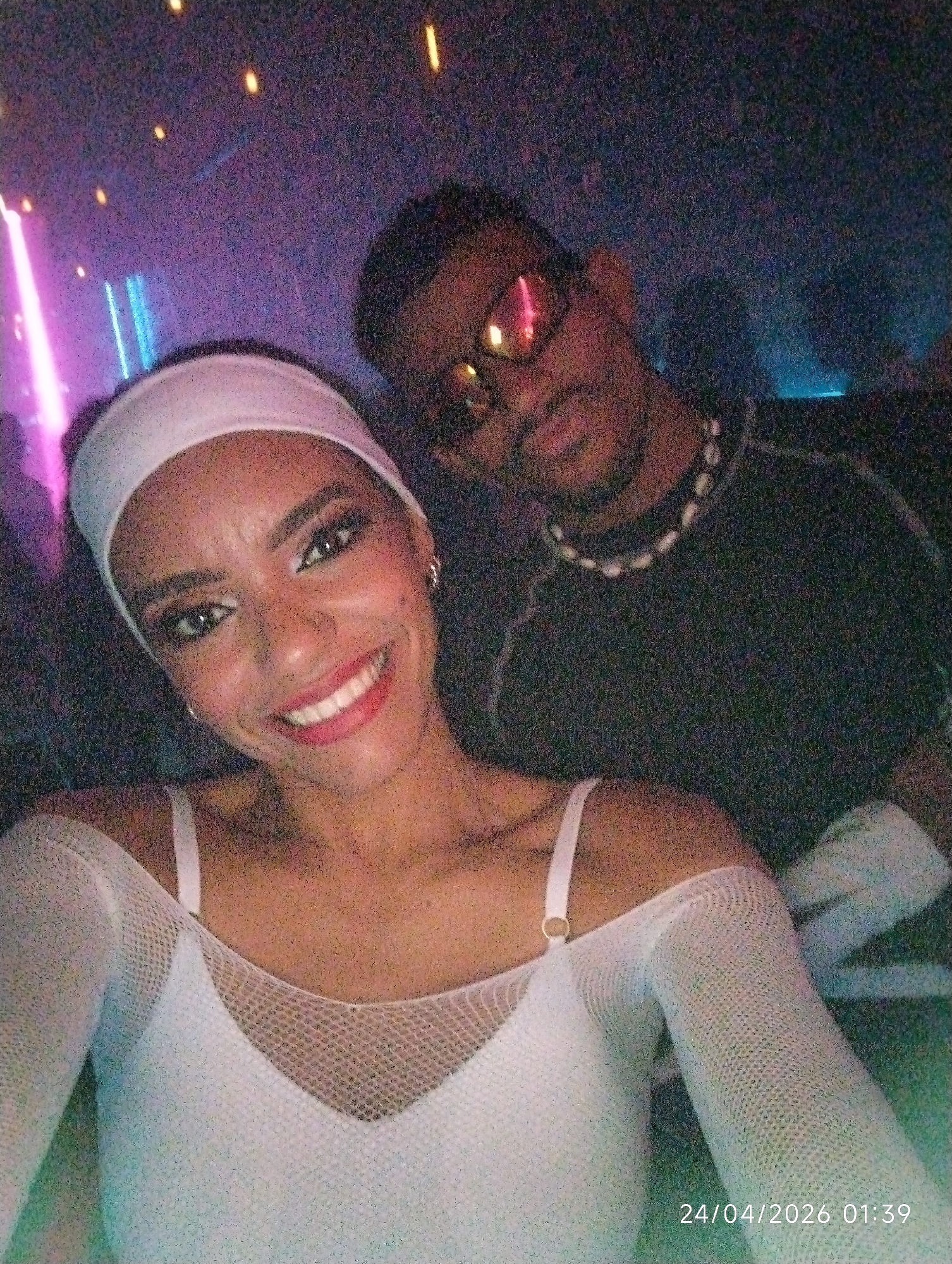 Two people photographed at nightclub venue
