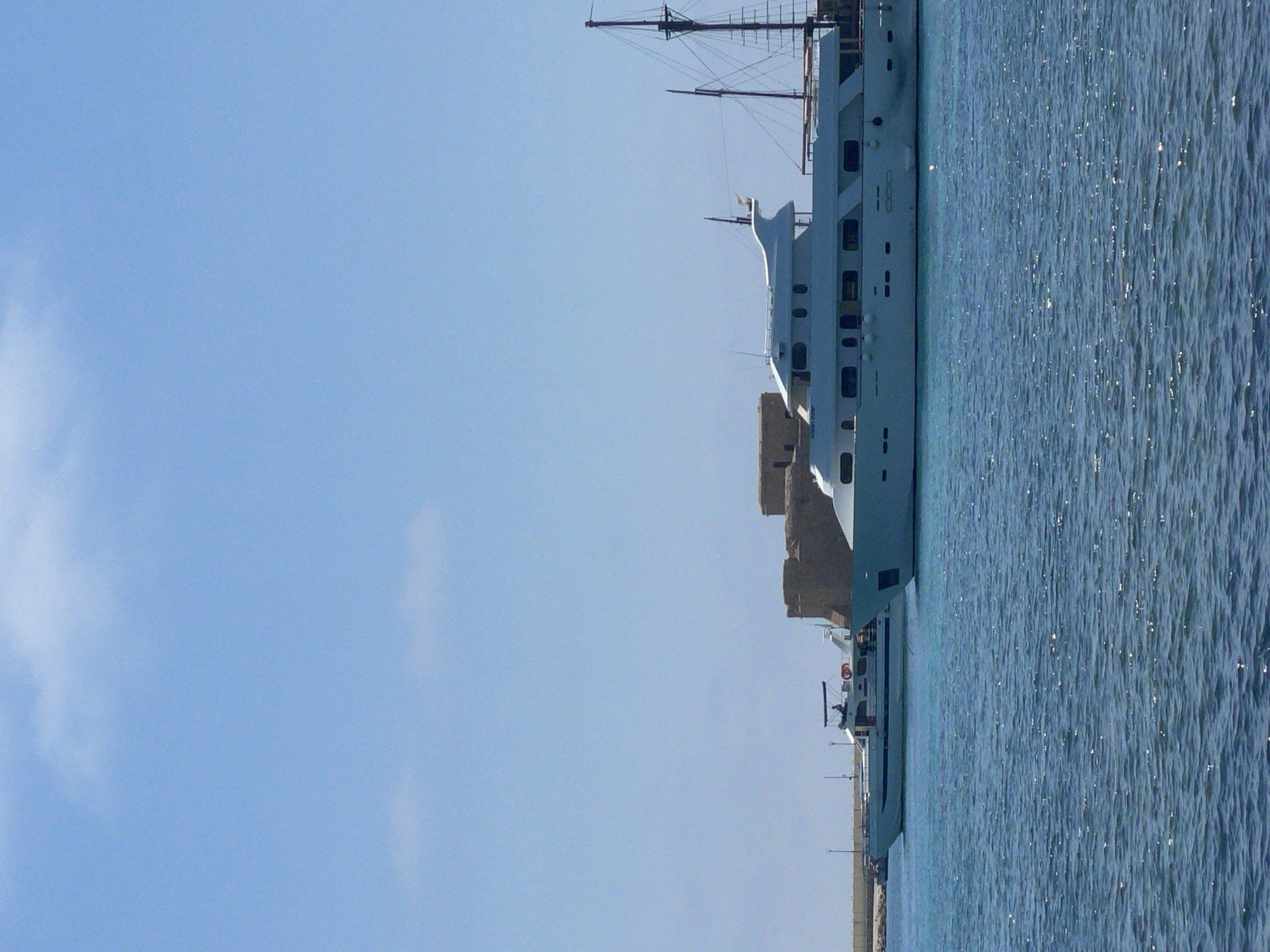 Sunny morning along Paphos harbor and bougainvillea-lined streets