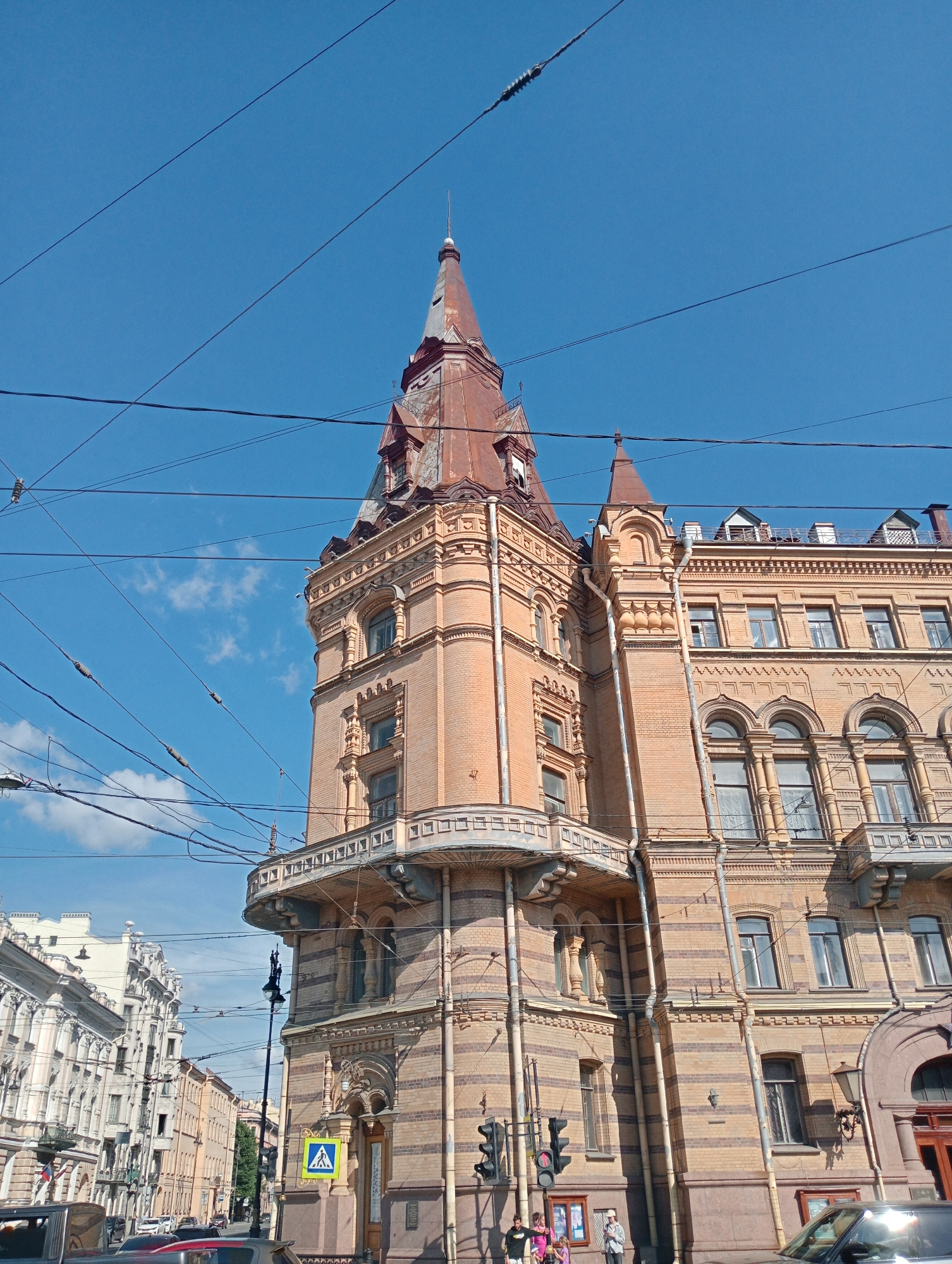 Ornate brick building with dragon ceramic murals, Saint Petersburg