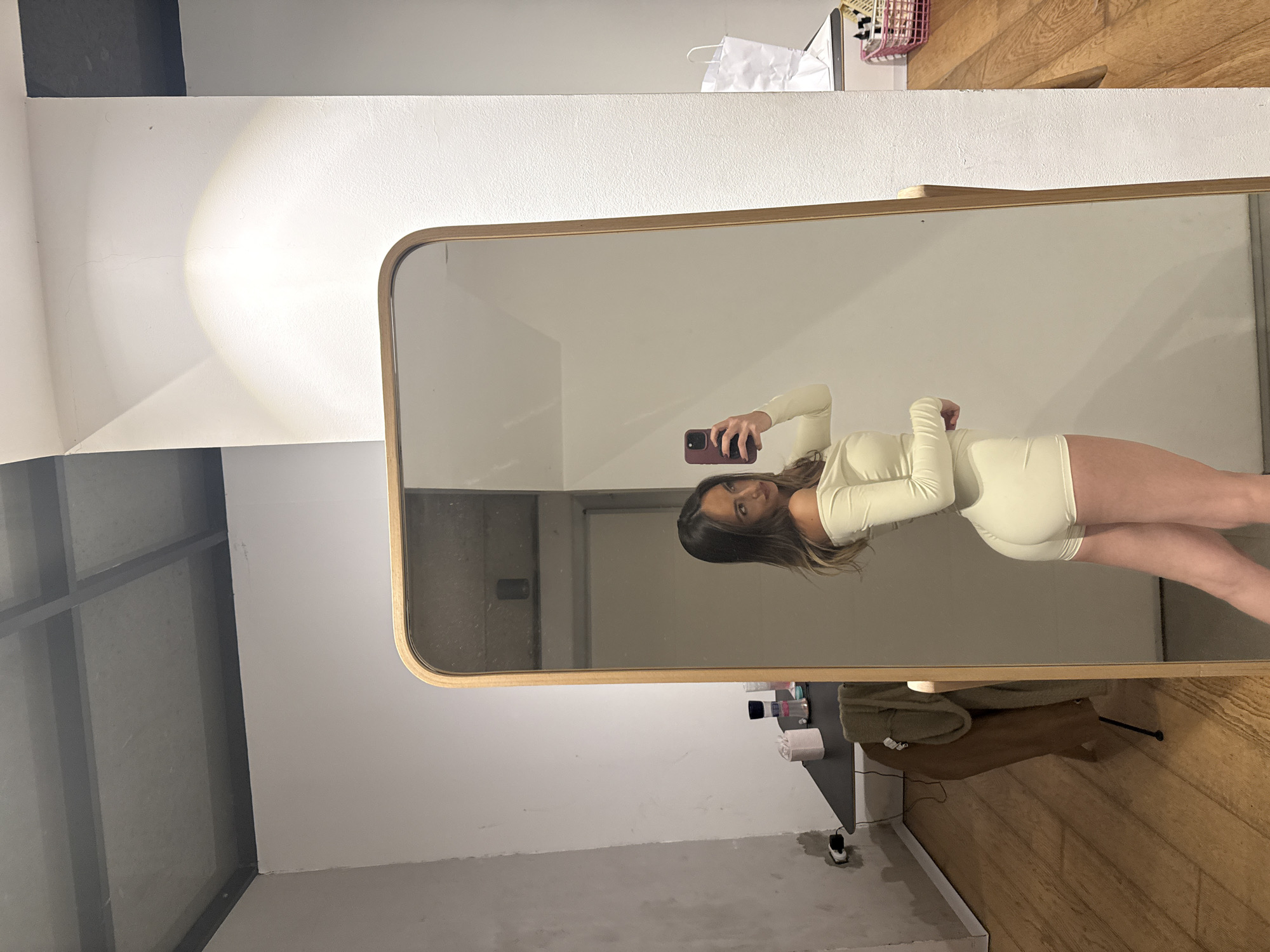 Woman Takes Mirror Selfie in Bodysuit in Herzliya