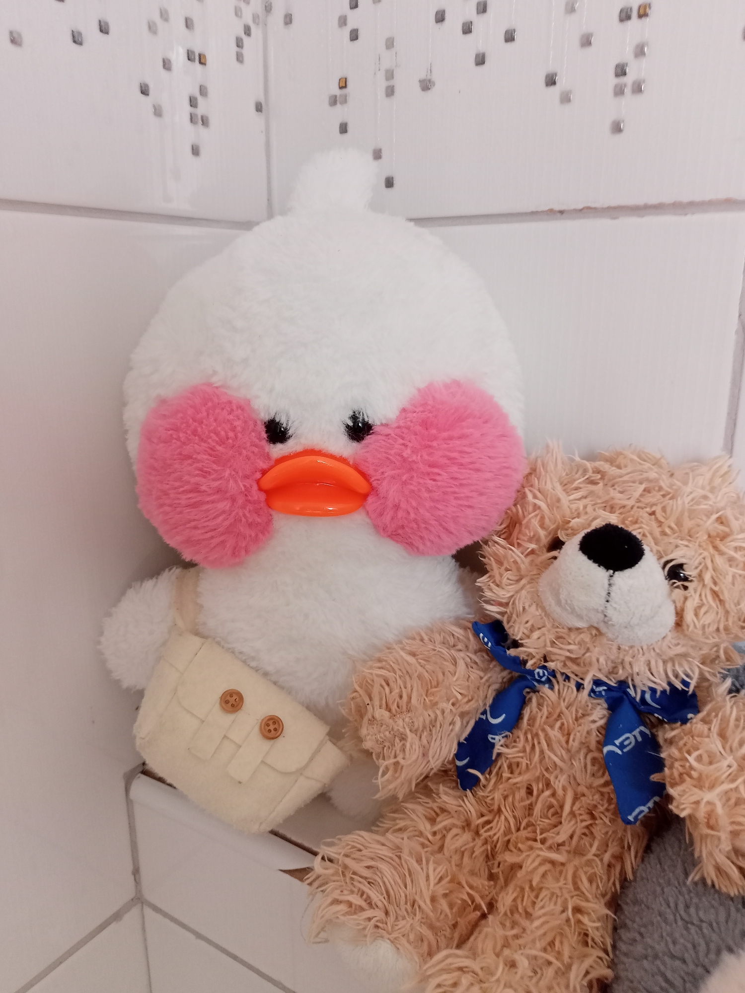Decorative shelf in Korenovsk displays bags, toys, and accessories
