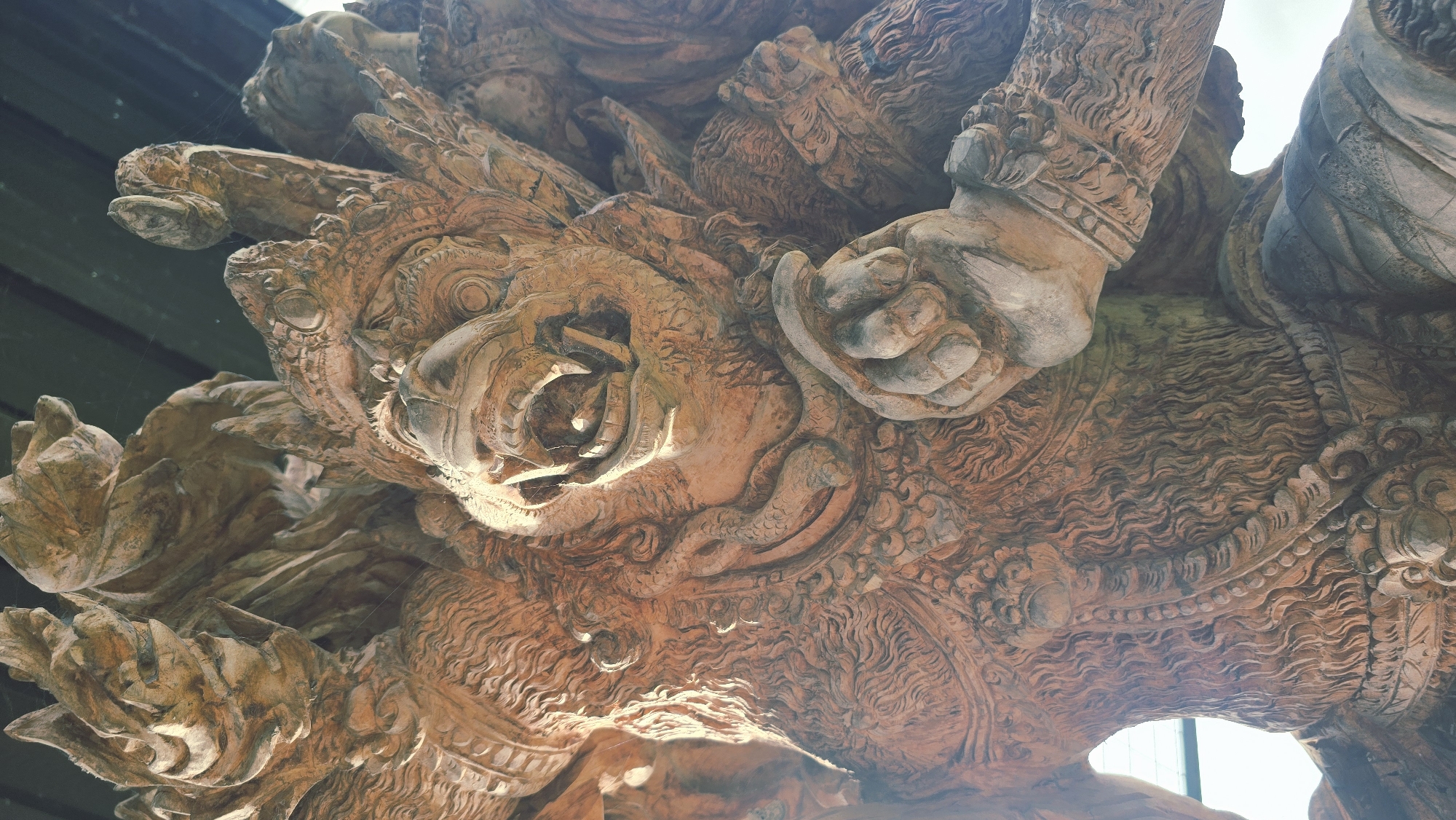 Traditional Balinese stone carvings documented in Payangan, Indonesia