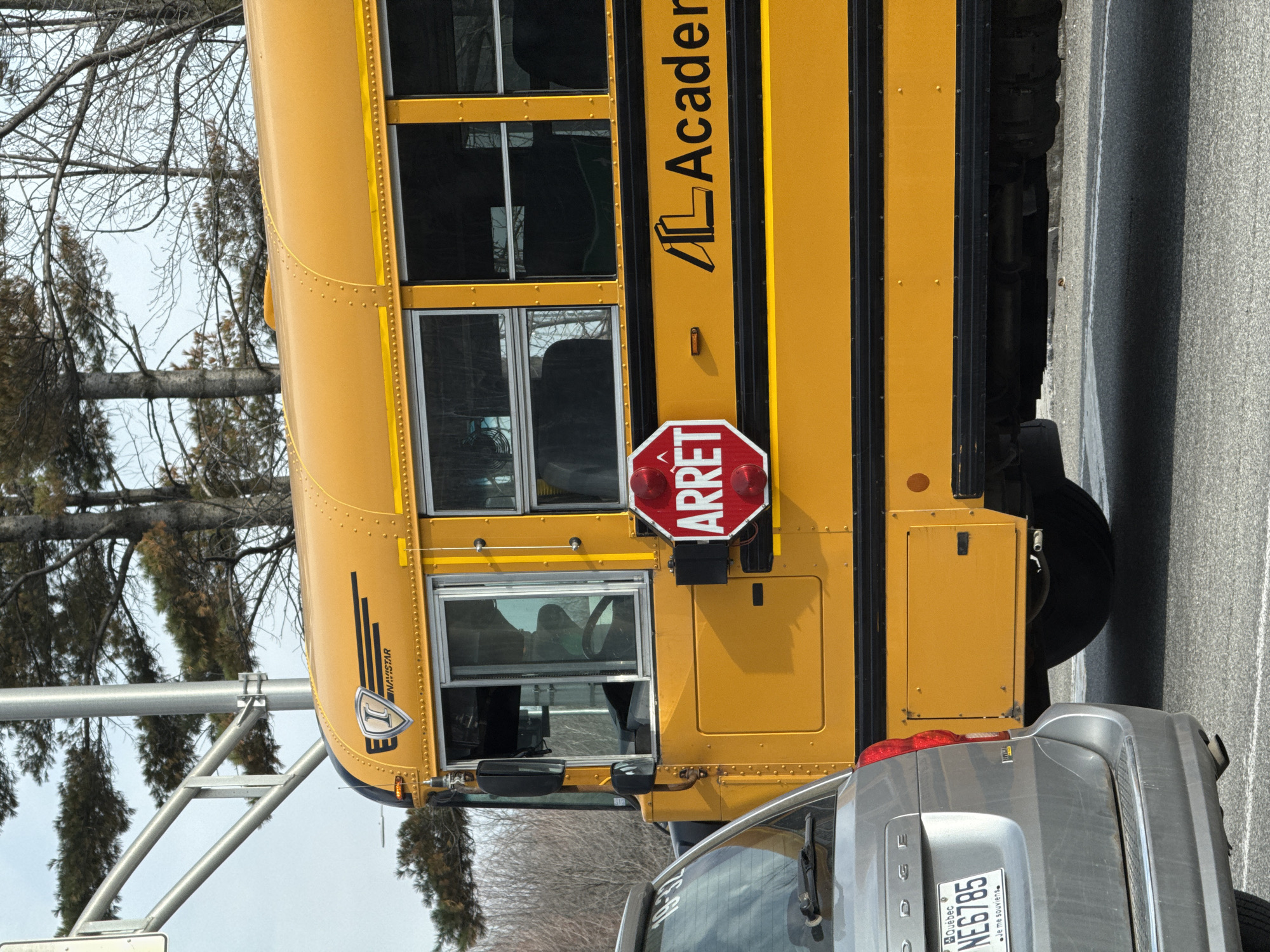 School bus stop sign activated in Blainville evening
