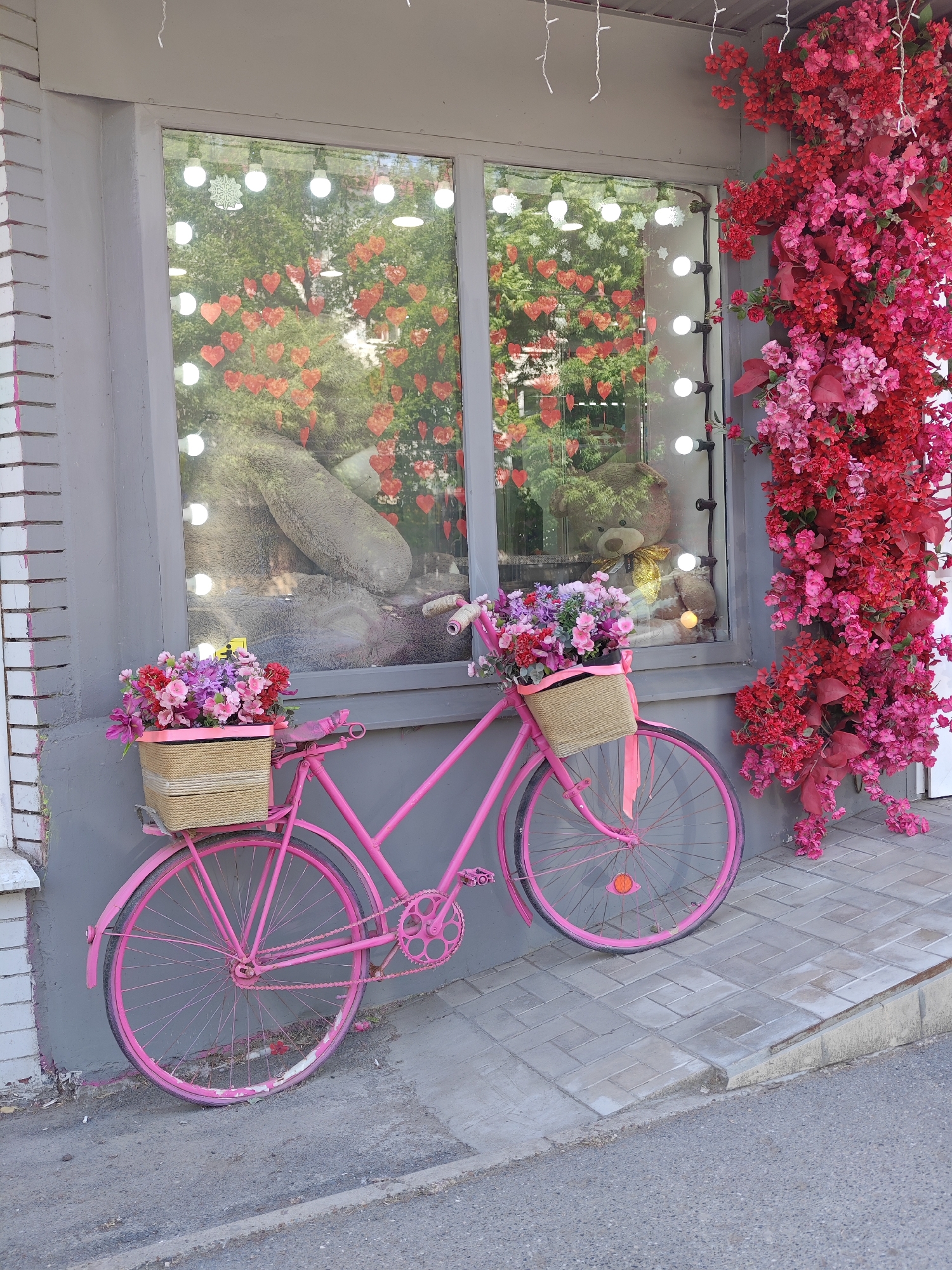 Pink flower bicycle spotted outside Ufa shop window