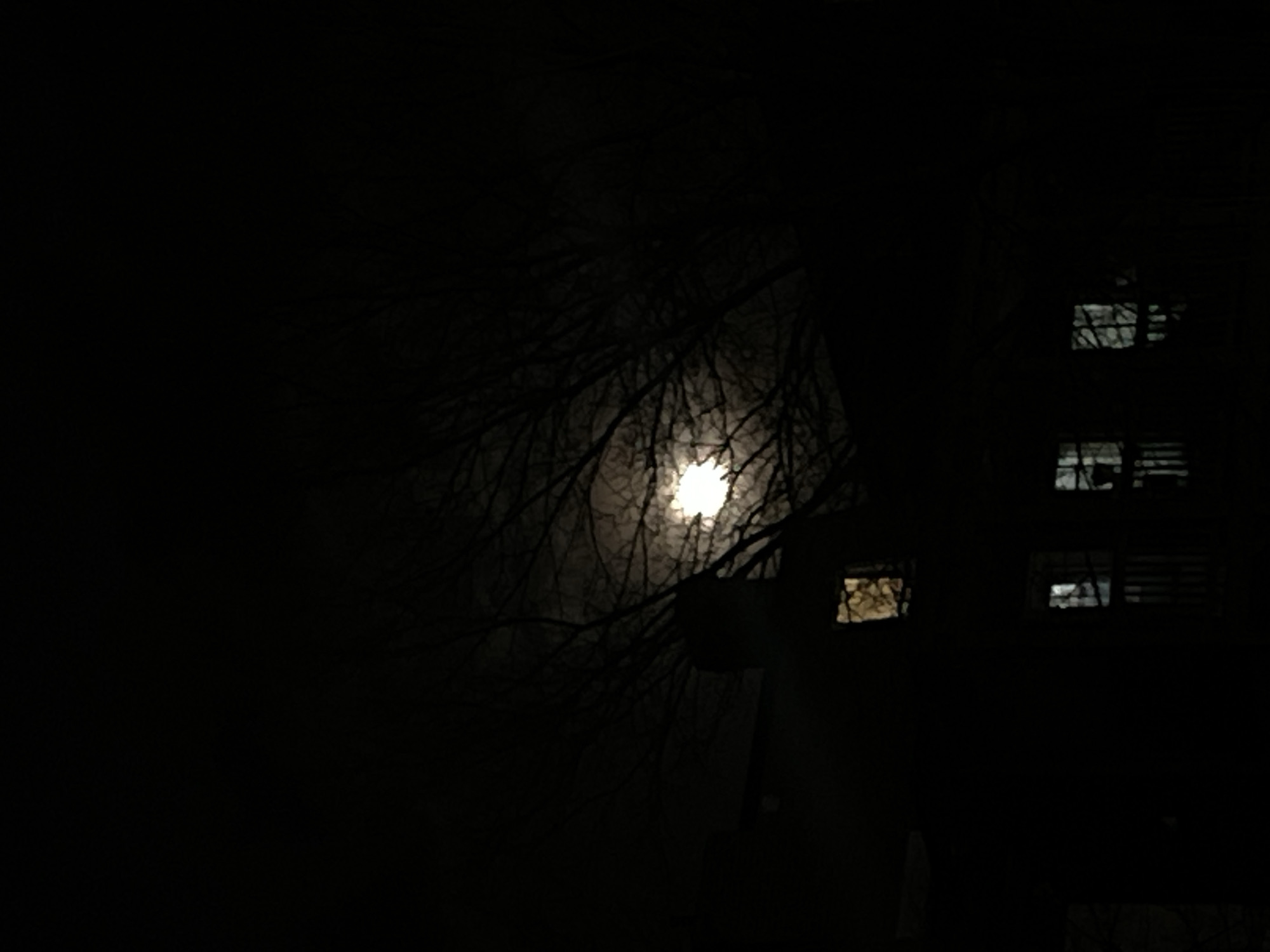 Full moon illuminates quiet Newburgh streets before dawn
