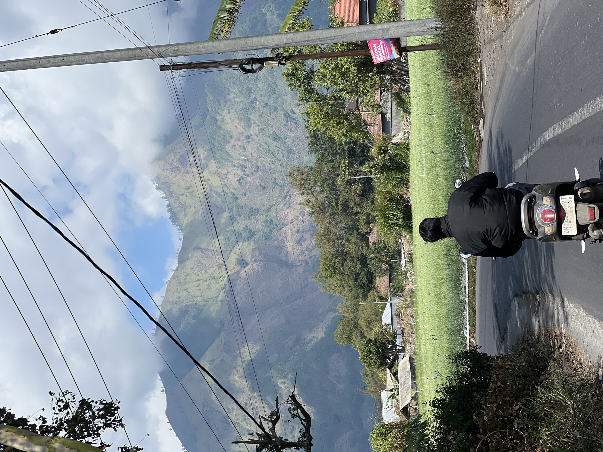 Scooter ride through Kintamani's sunny rural roads