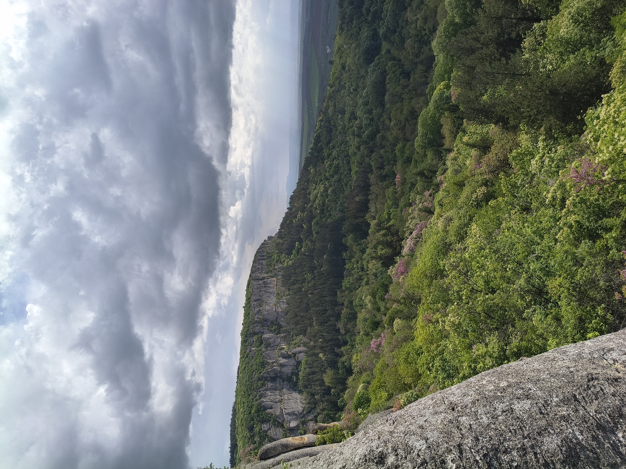 Tourist documents scenic views at Bulgaria's Madara archaeological site