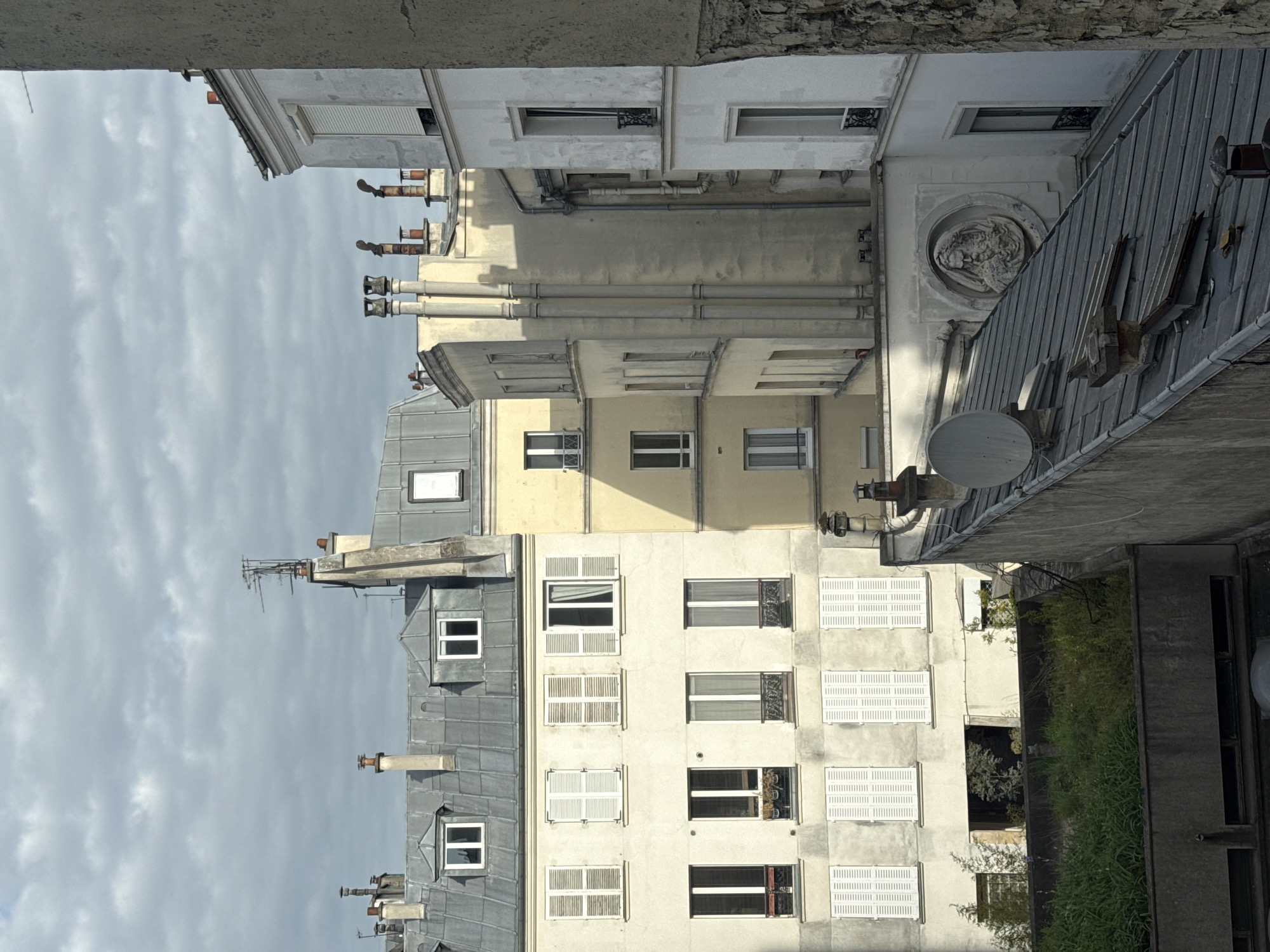 Witness captures upward view of Paris urban architecture