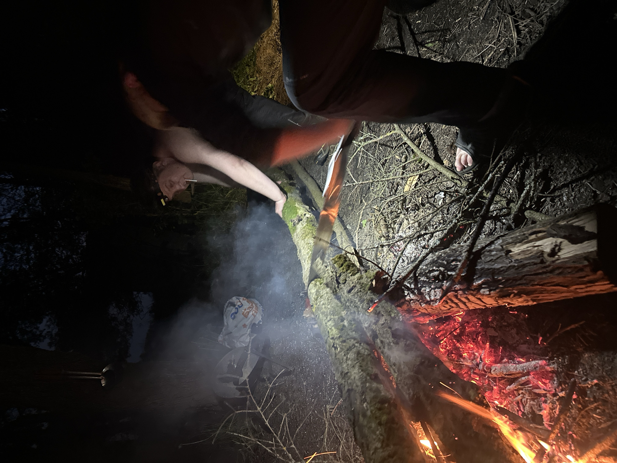Nighttime campfire gathering documented in rural Belarus village