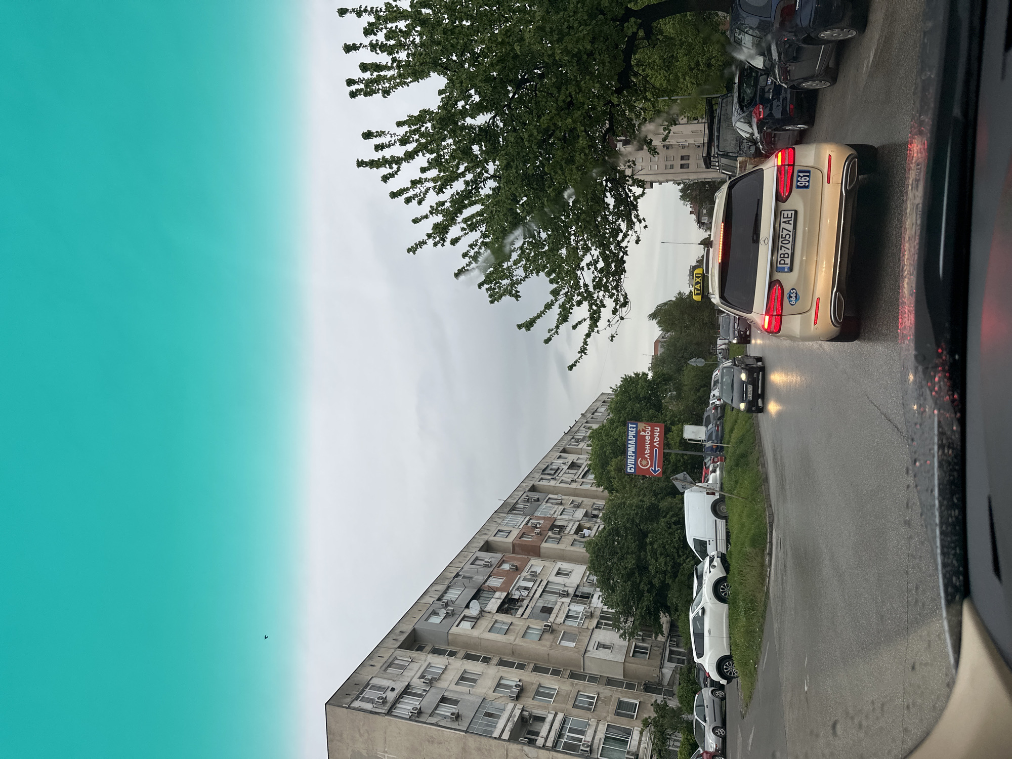 Driver documents rainy morning commute through Plovdiv, Bulgaria