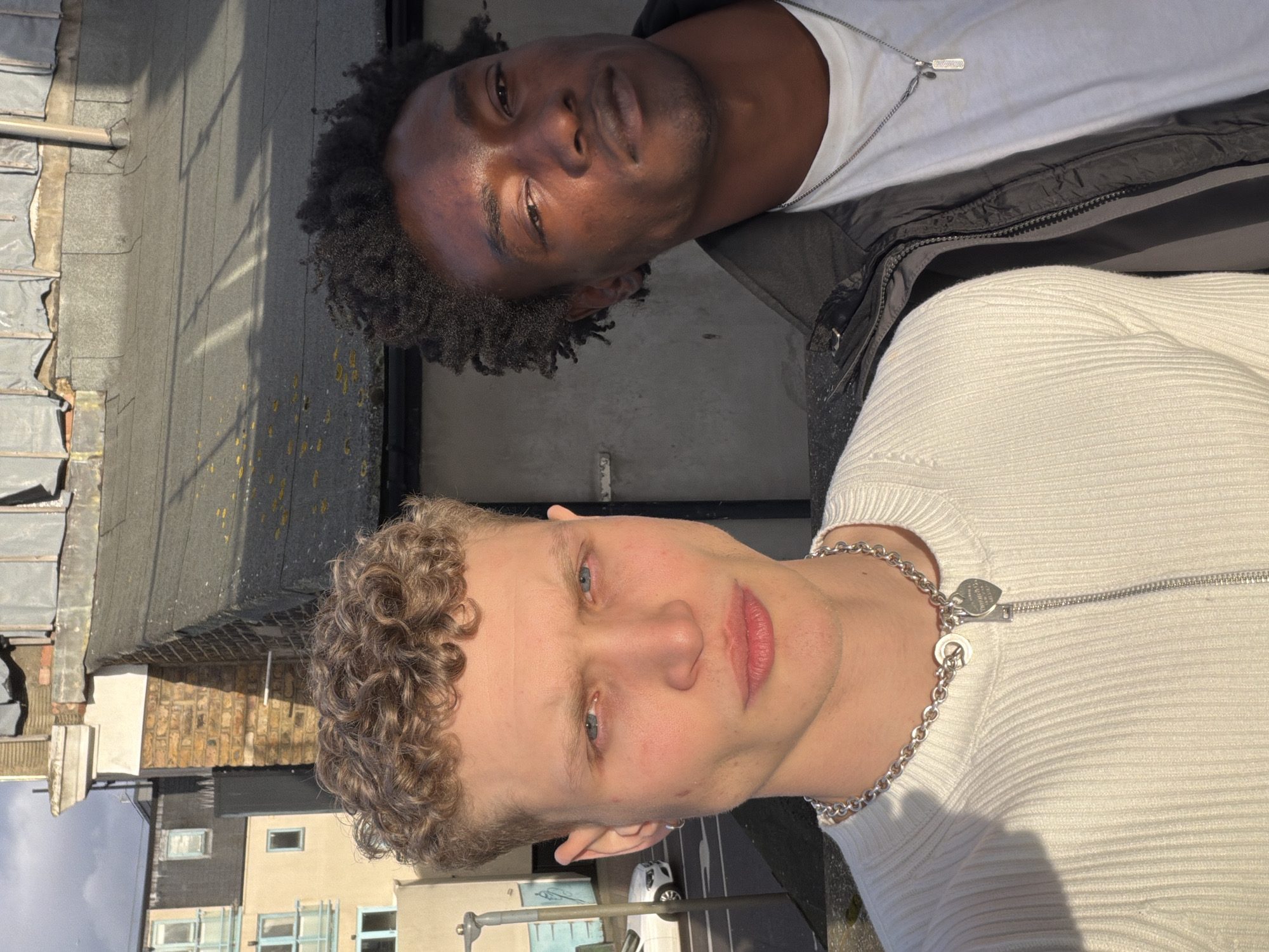Two young men spotted together on London rooftop