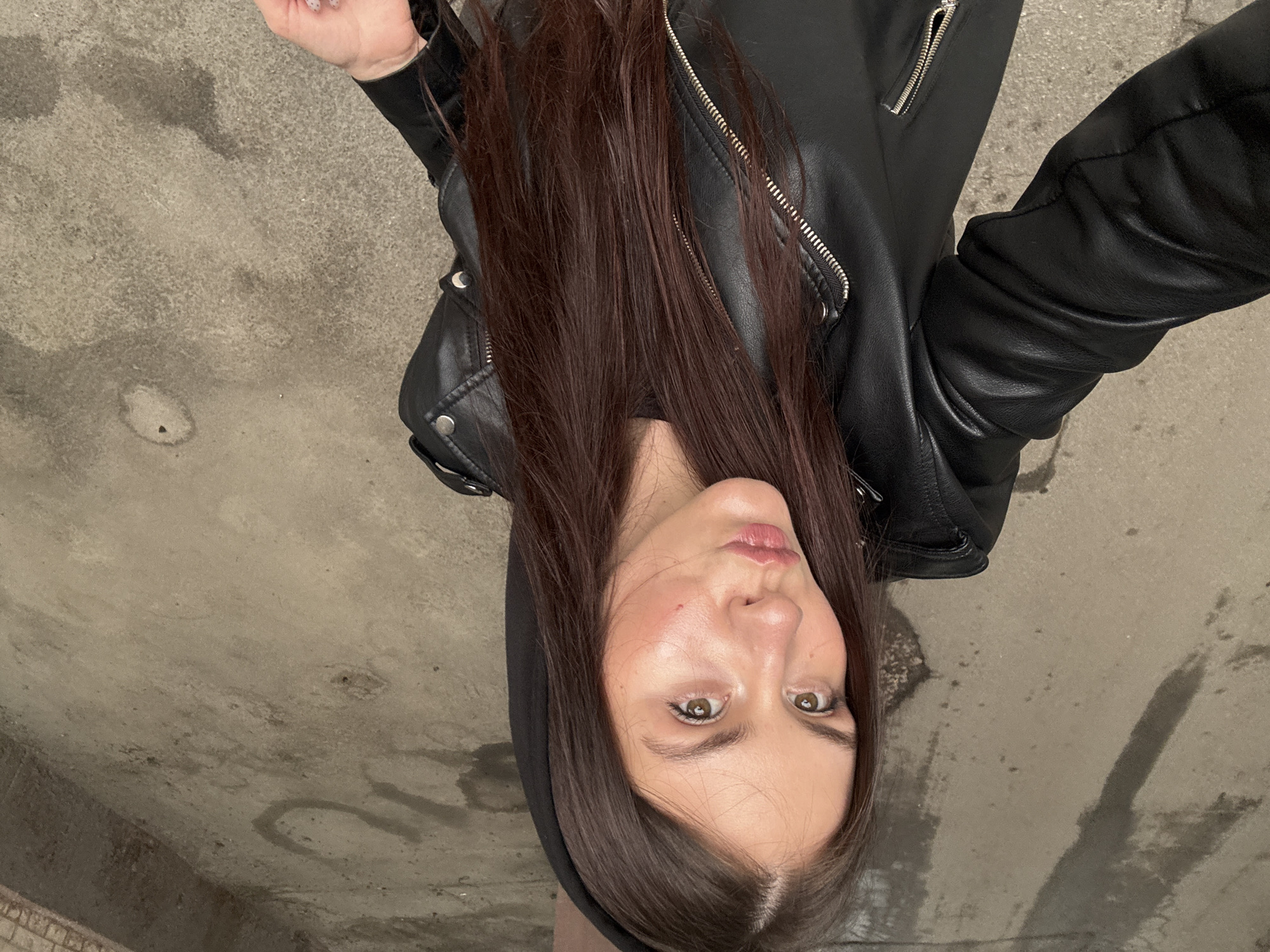 Woman photographed at unusual angle in Saint Petersburg park
