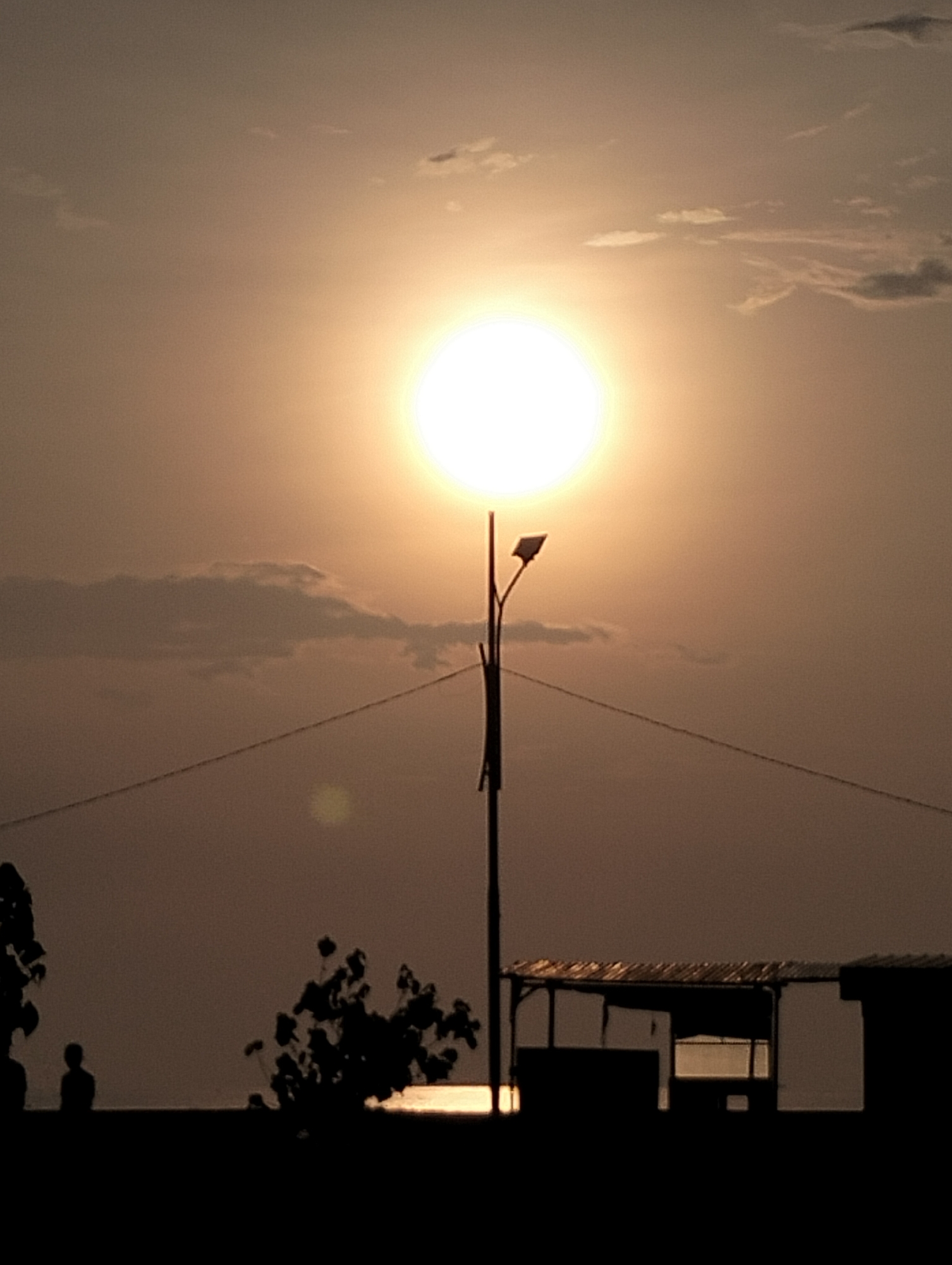 Golden hour captured over waters in Lhokseumawe, Indonesia