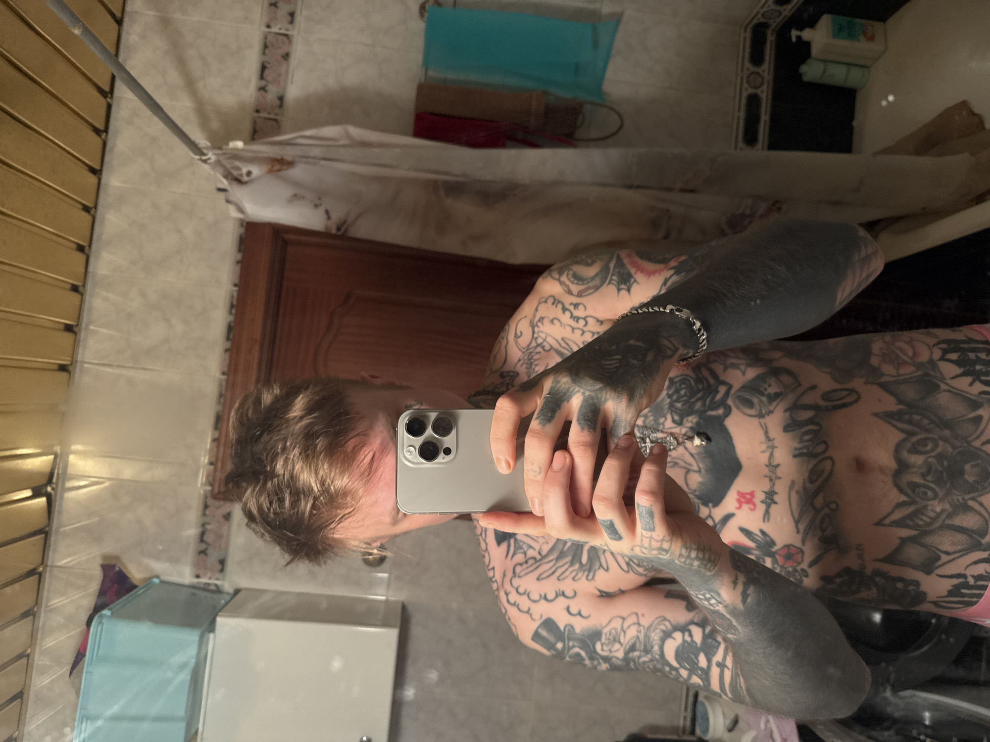Person takes bathroom selfie in Moscow