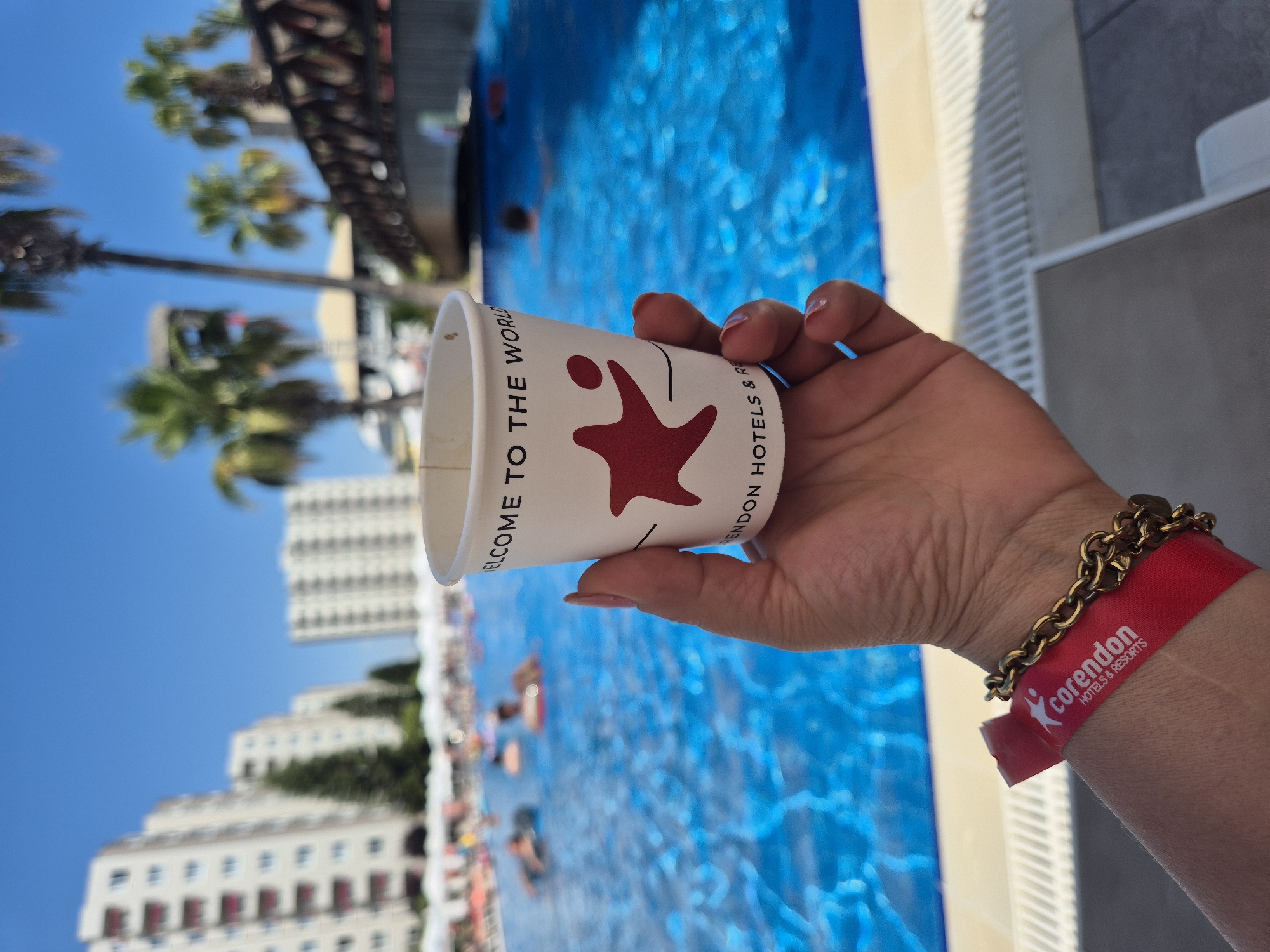 Sunny resort pool day at a Corendon Hotels property