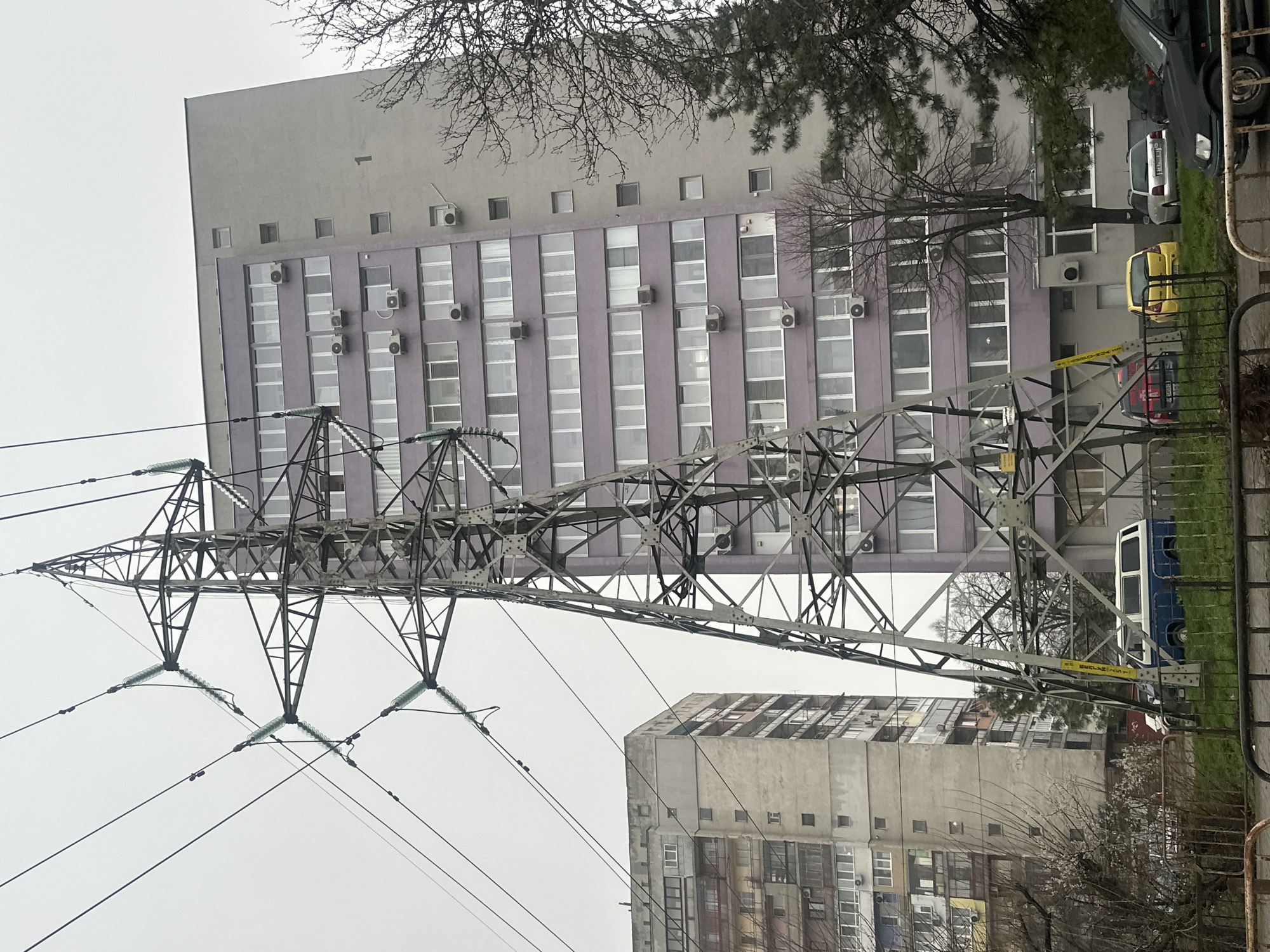 Power lines and pylon captured in overcast Dobrich