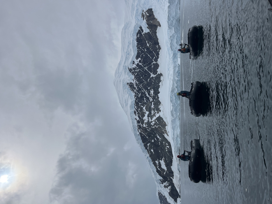 Antarctic expedition conducts zodiac operations near cruise ship