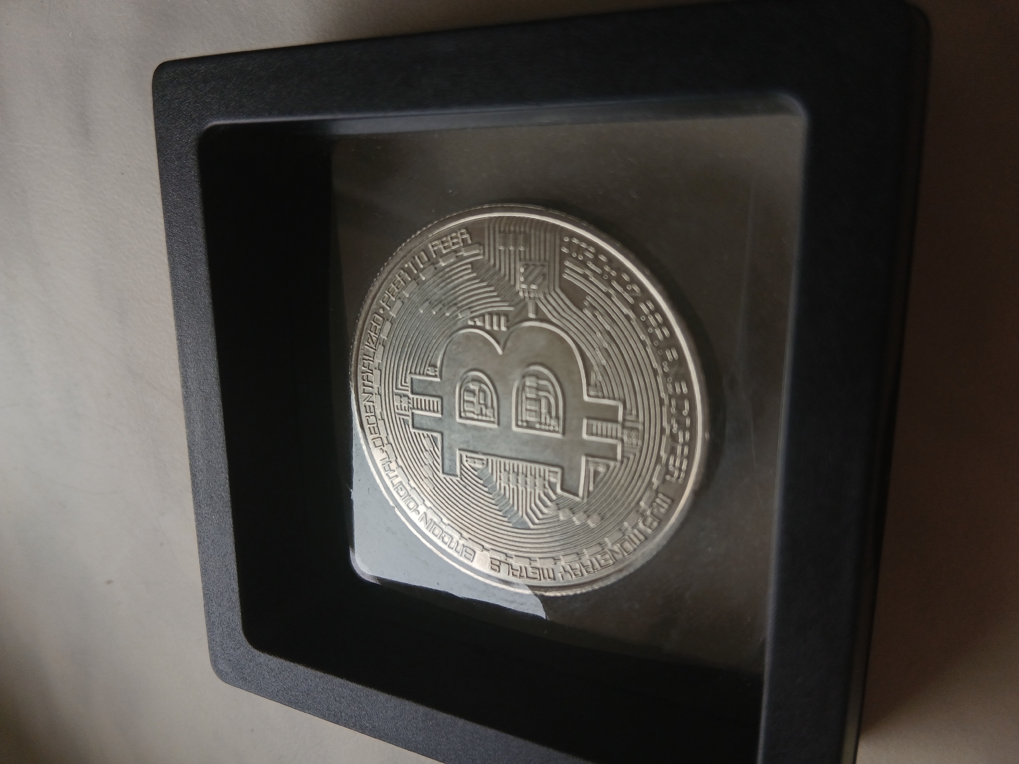 Bitcoin display and residential street scene documented separately